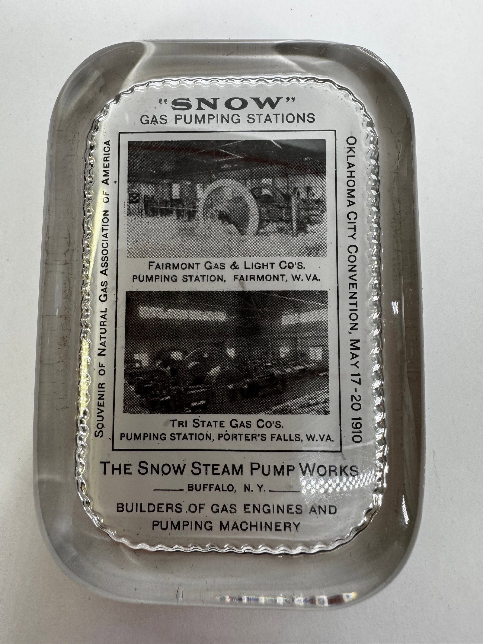 Antique Snow Steam Pump Works Advertising Glass Paperweight 1910: Antique glass advertising paperweight promoting The Snow Steam Pump Works of Buffalo, New York. Issued as a souvenir for the Natural Gas Association of America, Oklahoma City Convention, May 17–20, 