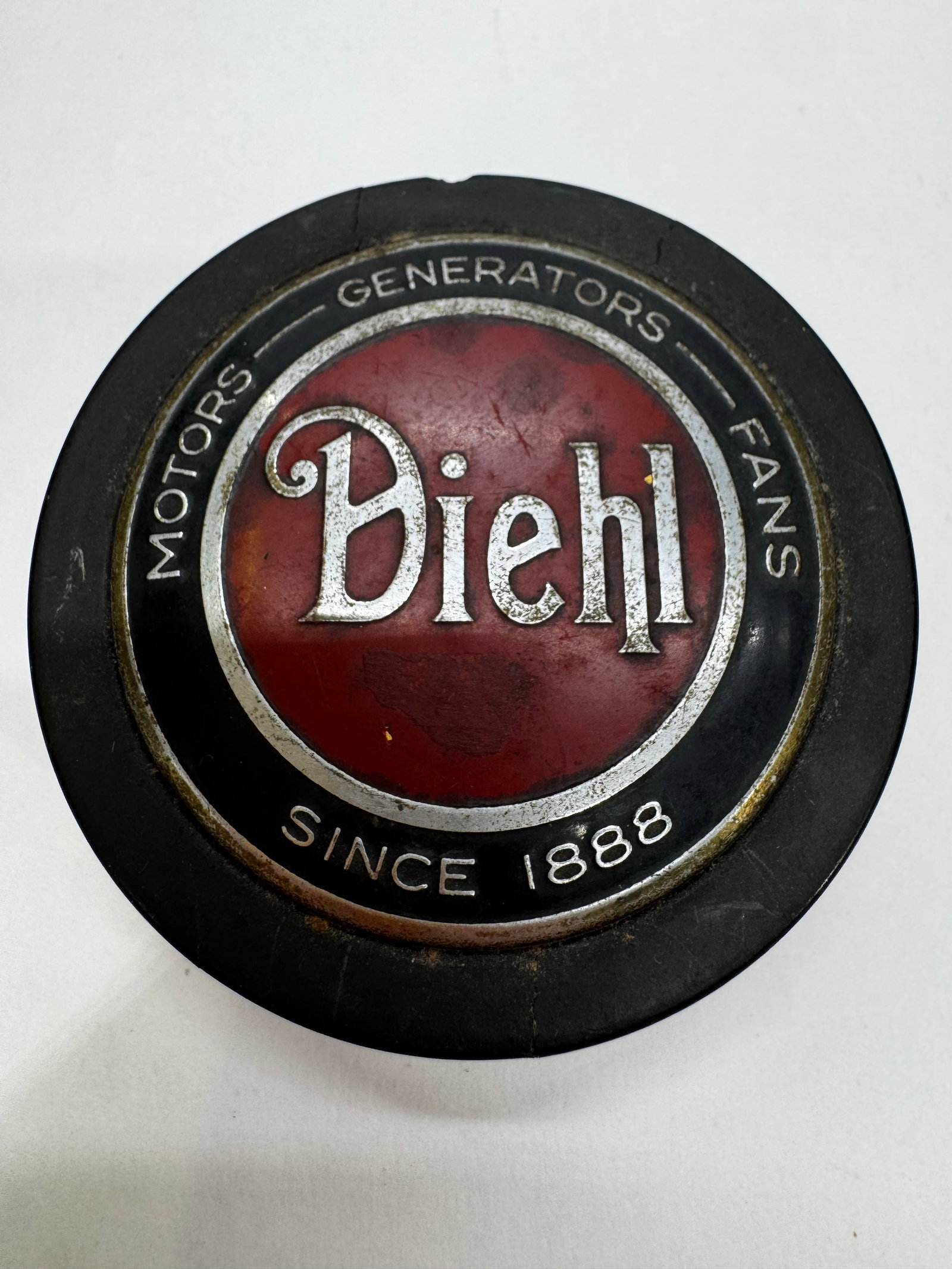 Vintage Diehl Motors Generators Fans Bakelite Paperweight: Vintage Diehl advertising paperweight featuring the classic red, black, and silver “Diehl – Motors • Generators • Fans – Since 1888” logo. Made of molded Bakelite or hard plastic