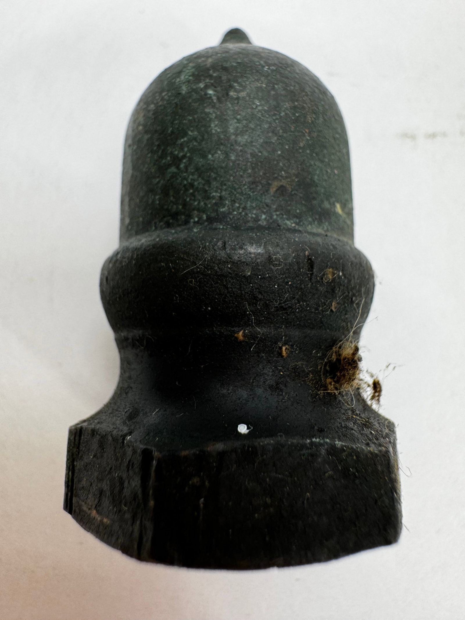 Vintage Black Threaded Pipe Cap Hydraulic Fitting: Vintage black metal threaded pipe cap or hydraulic fitting with a hexagonal base and female internal threads for wrench installation. Suitable for plumbing, hydraulic, industrial, or agricultural irri