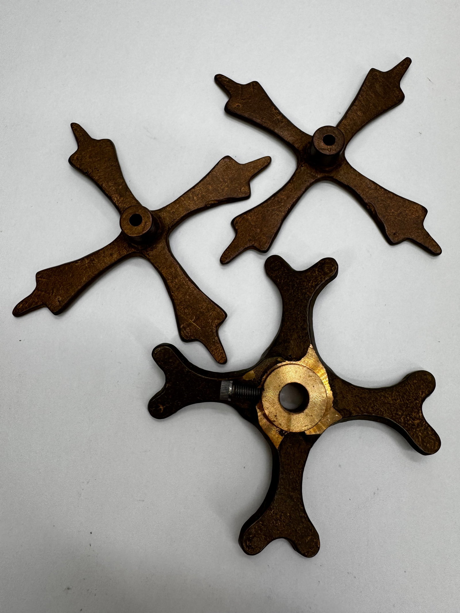 Lot of 3 Antique Electric Fan Blade Hubs/Spiders: Lot of three antique fan blade hubs (spiders) for early electric fans. Constructed of cast iron and brass/bronze, these hubs were designed to secure fan blades to the motor shaft. Suitable for restora