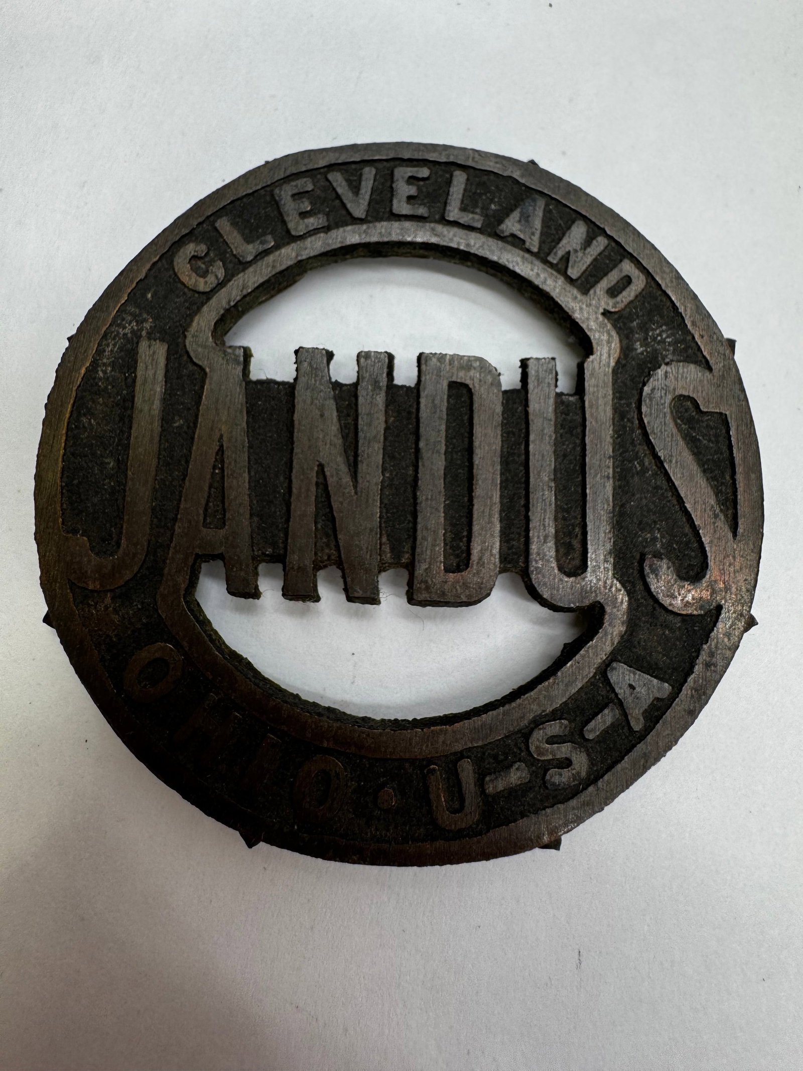 Antique Jandus Electric Fan Cast Iron Motor Badge c.1900–1915: Original cast iron Jandus Electric fan motor badge dating to the early 1900s. Features the iconic openwork “JANDUS” lettering with “Cleveland, Ohio, U.S.A.” around the outer edge and o