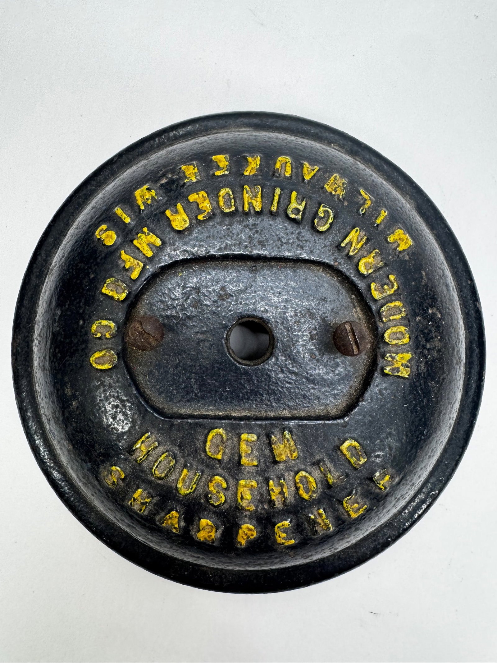 Vintage Gem Cast Iron Household Knife Sharpener: Vintage Gem Household Sharpener manufactured by the Modern Grinder Mfg. Co., Milwaukee, Wisconsin. Constructed of heavy cast iron with the original black finish and yellow painted lettering. Designed 