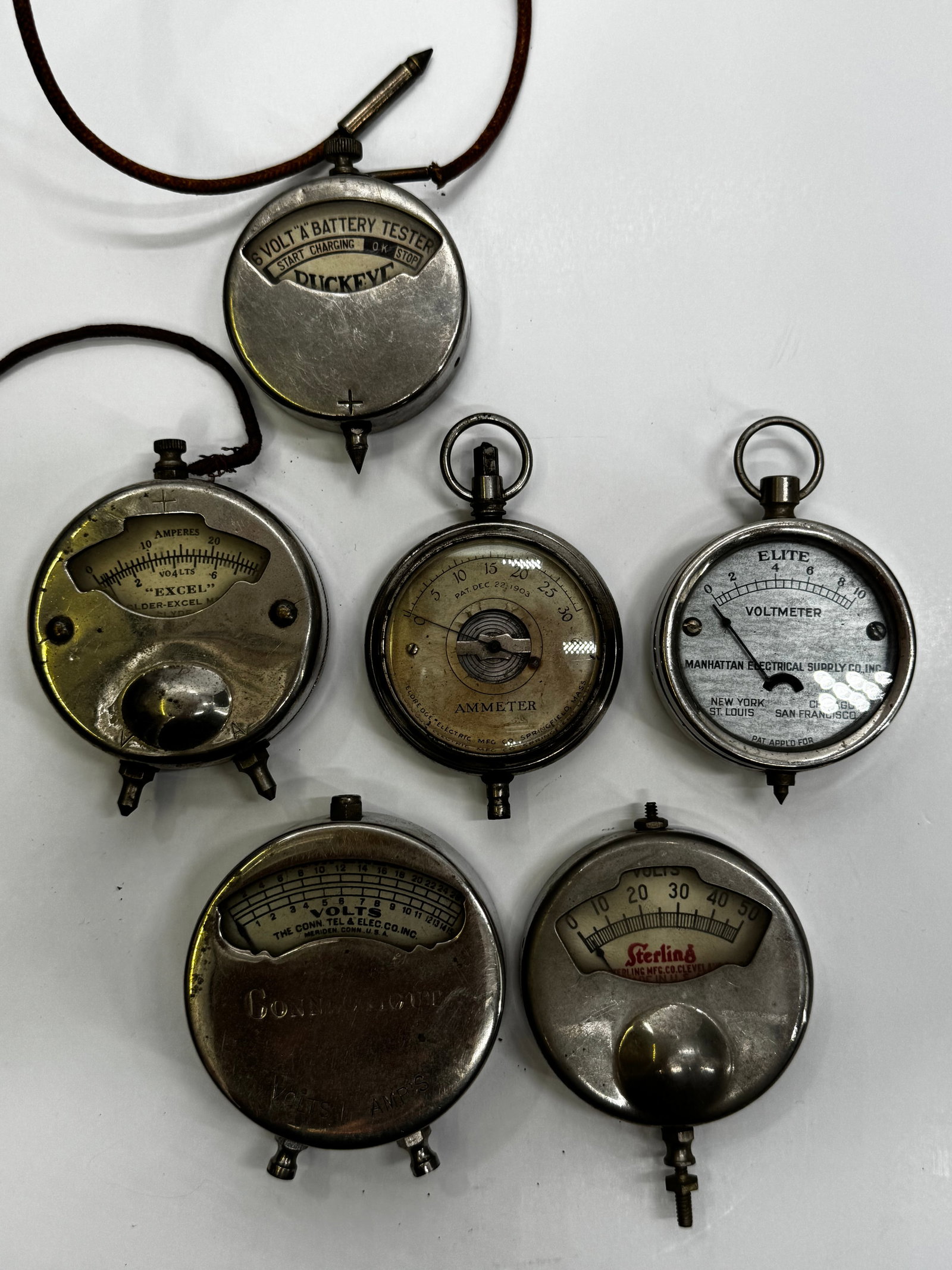 Lot of 6 Vintage Battery Testers Voltmeters Ammeters Buckeye Excel Elite: Lot of six vintage electrical testing instruments including Buckeye Battery Tester, Excel Ammeter/Voltmeter, Elite Voltmeter, Sterling Voltmeter, Connecticut Electric Co. Voltmeter, and an early Ammet