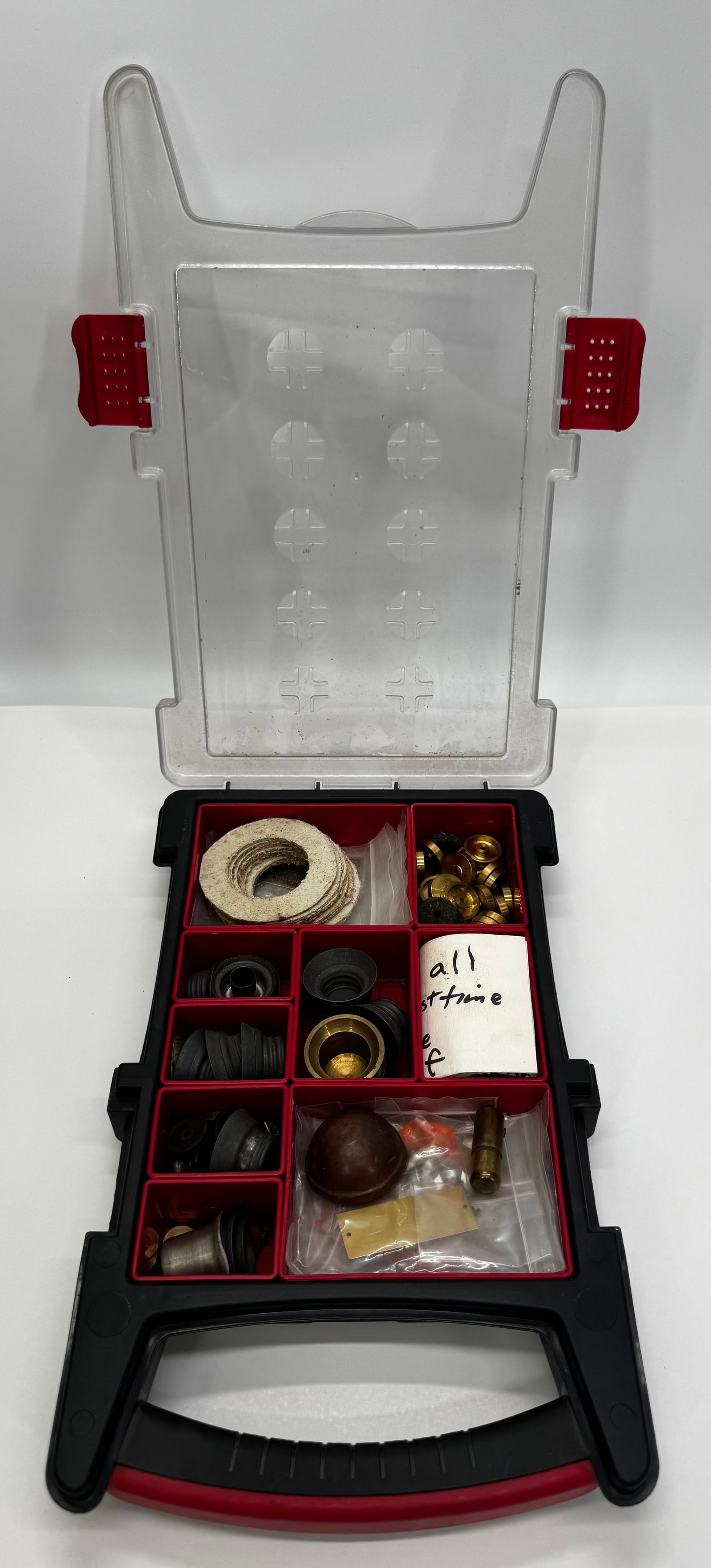 Vintage Clock & Watchmaker Repair Parts Lot: Large mixed lot of vintage clock and watch repair parts in an organizer case. Includes brass bushings, fiber and felt washers, rubber grommets, friction discs, spacers, and miscellaneous replacement c