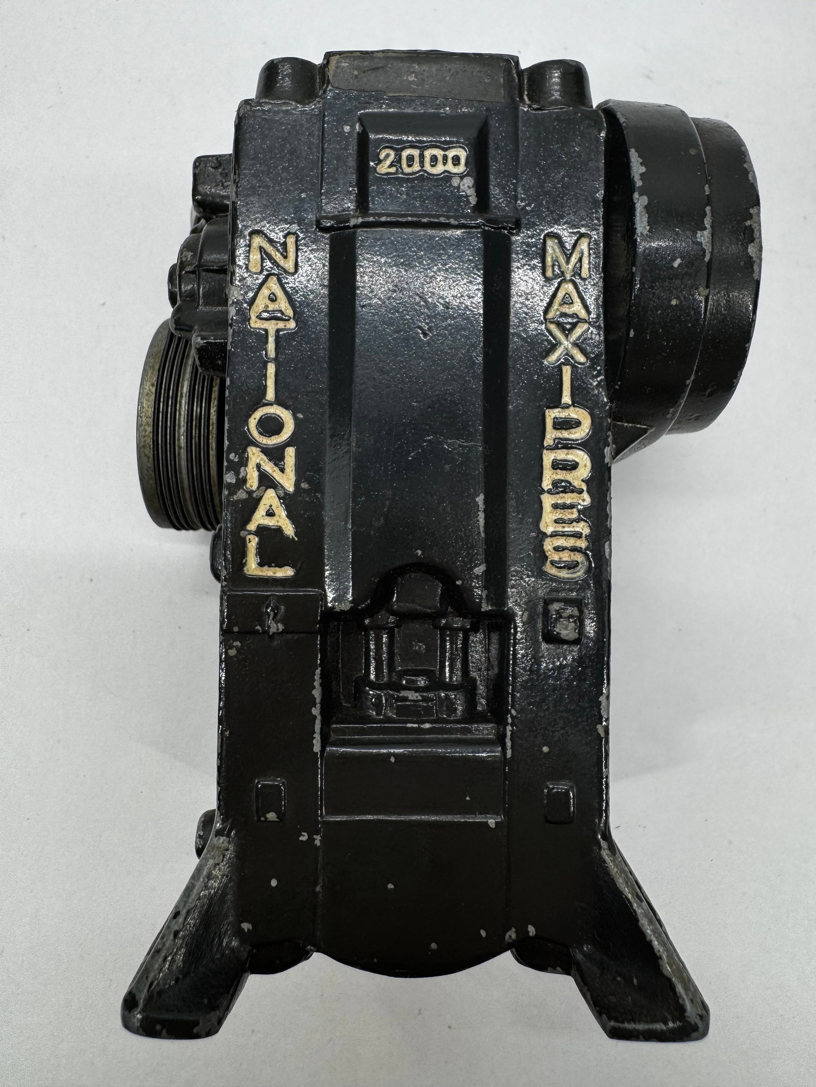 Vintage National Maxipump 2000 Cast Iron Air Compressor: Vintage National Maxipump 2000 cast iron air compressor or tire inflator featuring a heavy-duty black cast metal body with raised gold lettering and belt-driven pulley. Designed for shop or garage use