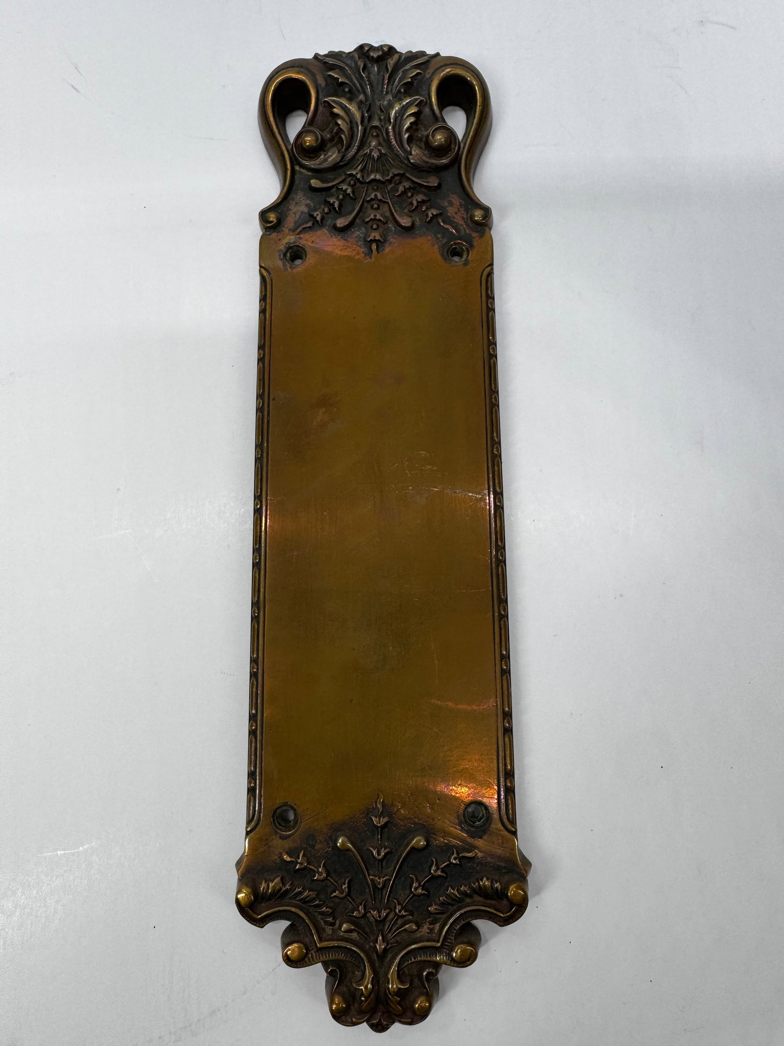 Antique Russell & Erwin Bronze Door Push Plate: Original antique Russell & Erwin Mfg. Co. solid bronze door push plate with ornate Victorian scrollwork at the top and bottom. Manufactured in New Britain, Connecticut, this architectural hardware pie