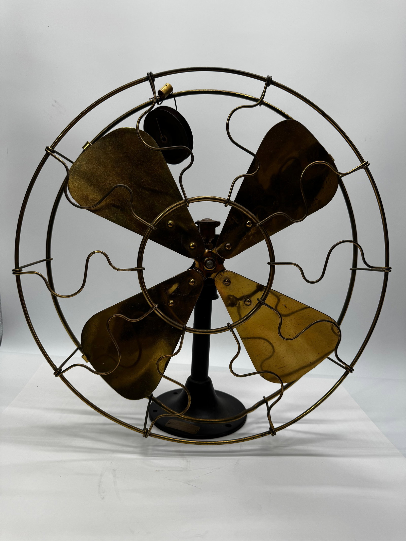 Antique Lawrence M. Stein Brass Blade Desk Fan Chicago Cast Iron Electric Fan: Antique Lawrence M. Stein electric desk fan manufactured in Chicago, Illinois. Features four original brass blades, an open brass wire cage, heavy cast iron base, and original Lawrence M. Stein Co., 8