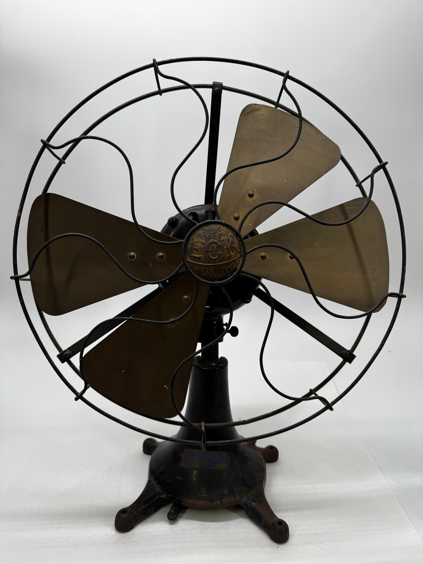 Antique ECK 16” Ming Blade Stationary Brass Blade Fan c.1905–1915: Rare antique ECK “Ming Blade” stationary electric desk fan, manufactured by the ECK Dynamo & Motor Co., Belleville, New Jersey, circa 1905–1915. Features a heavy cast iron base and motor hou