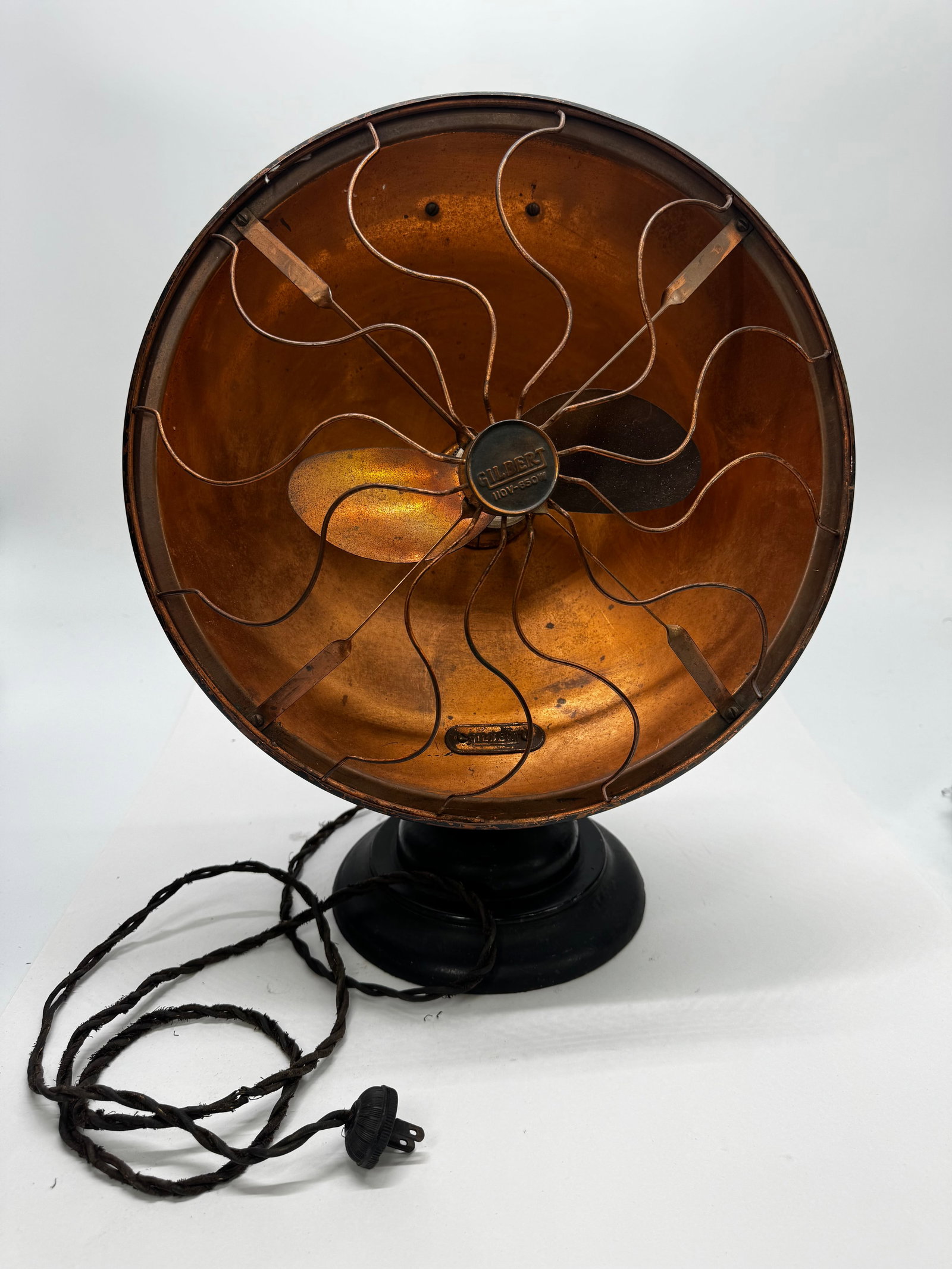 Vintage Gilbert Polar Cub Electric Heater Fan 110V 650W Copper Finish: Vintage Gilbert Polar Cub electric heater fan featuring a copper-finished reflector, two-blade fan, original Gilbert center badge marked 110V–650W, and original Polar Cub motor decal. A classic Art 