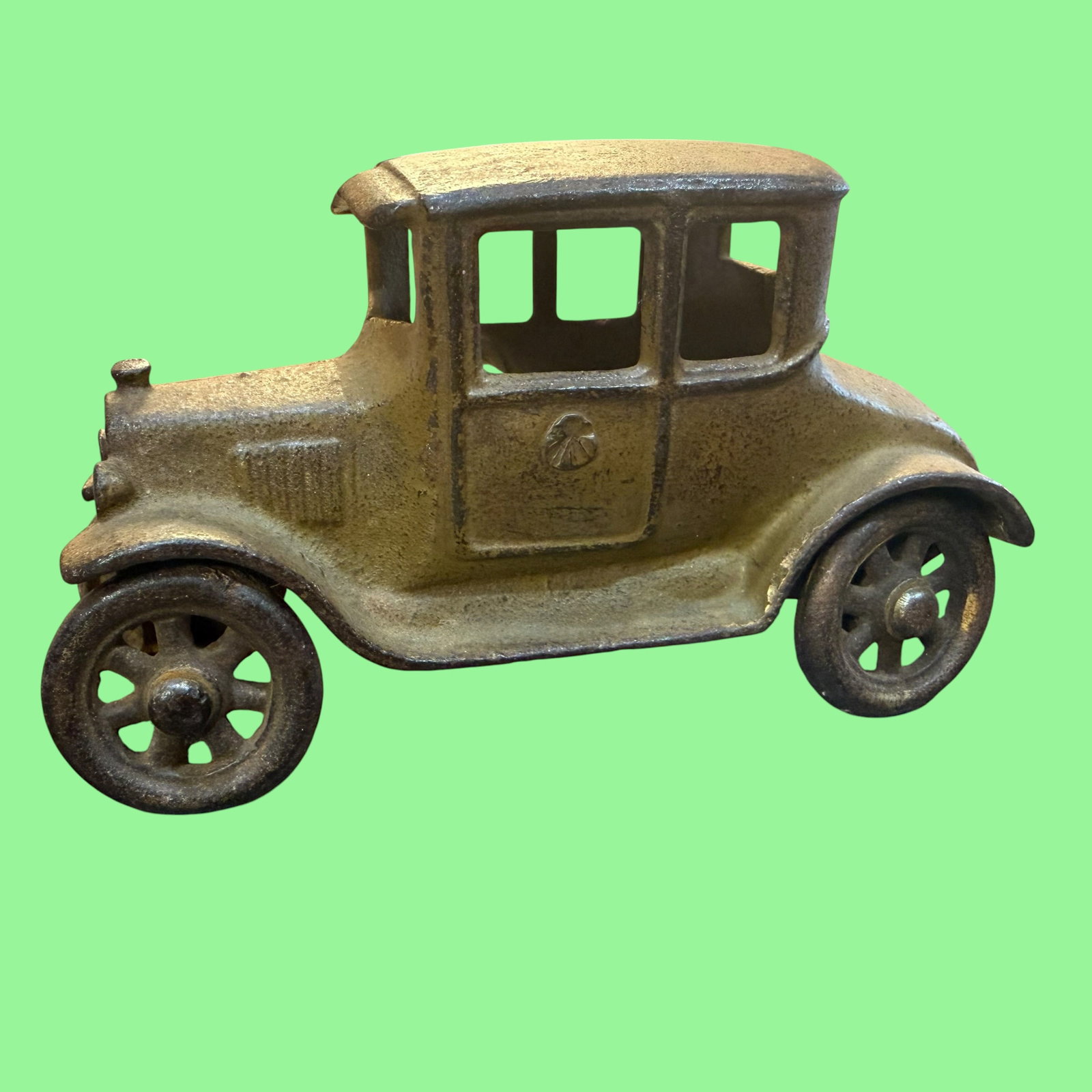 Kilgore Ford Model T Coupe Cast Iron Toy Car 5”: Description: Early cast iron toy car by Kilgore. Ford Model T Coupe. Original tan - brown finish. Part Numbers SF 600A & SF 601A. / Size: 5” long. / Condition: Great, ready to be enjoyed. / ****