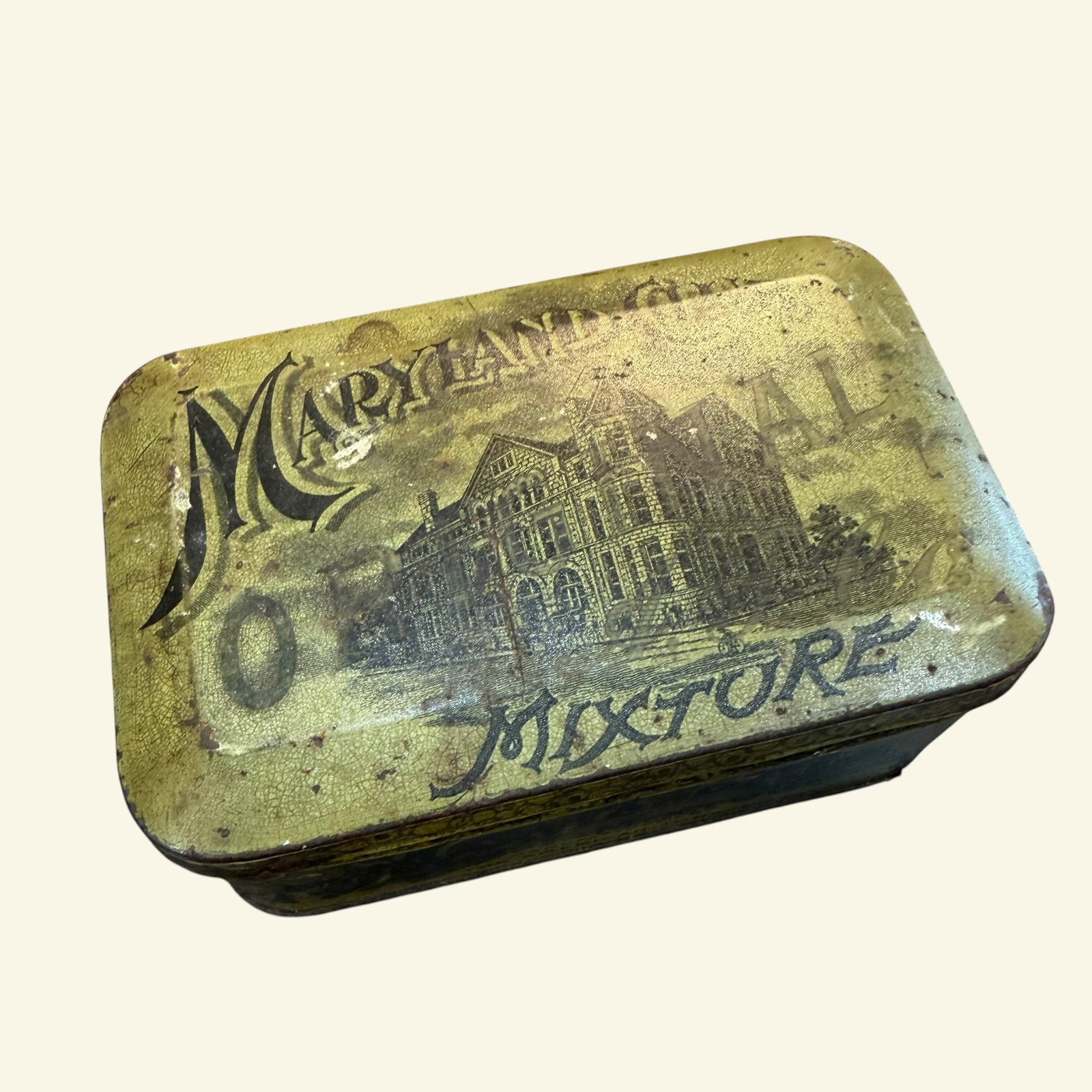 Early 1900s Maryland Club Original Mixture American Tobacco Tin Can: Description: Maryland Club tobacco tin. Hinged box container. / Material: Metal, tin. / Size: Overall 4” x 2.5” x 1.75”. / Condition: Ready to be enjoyed. Some age and handling wear 