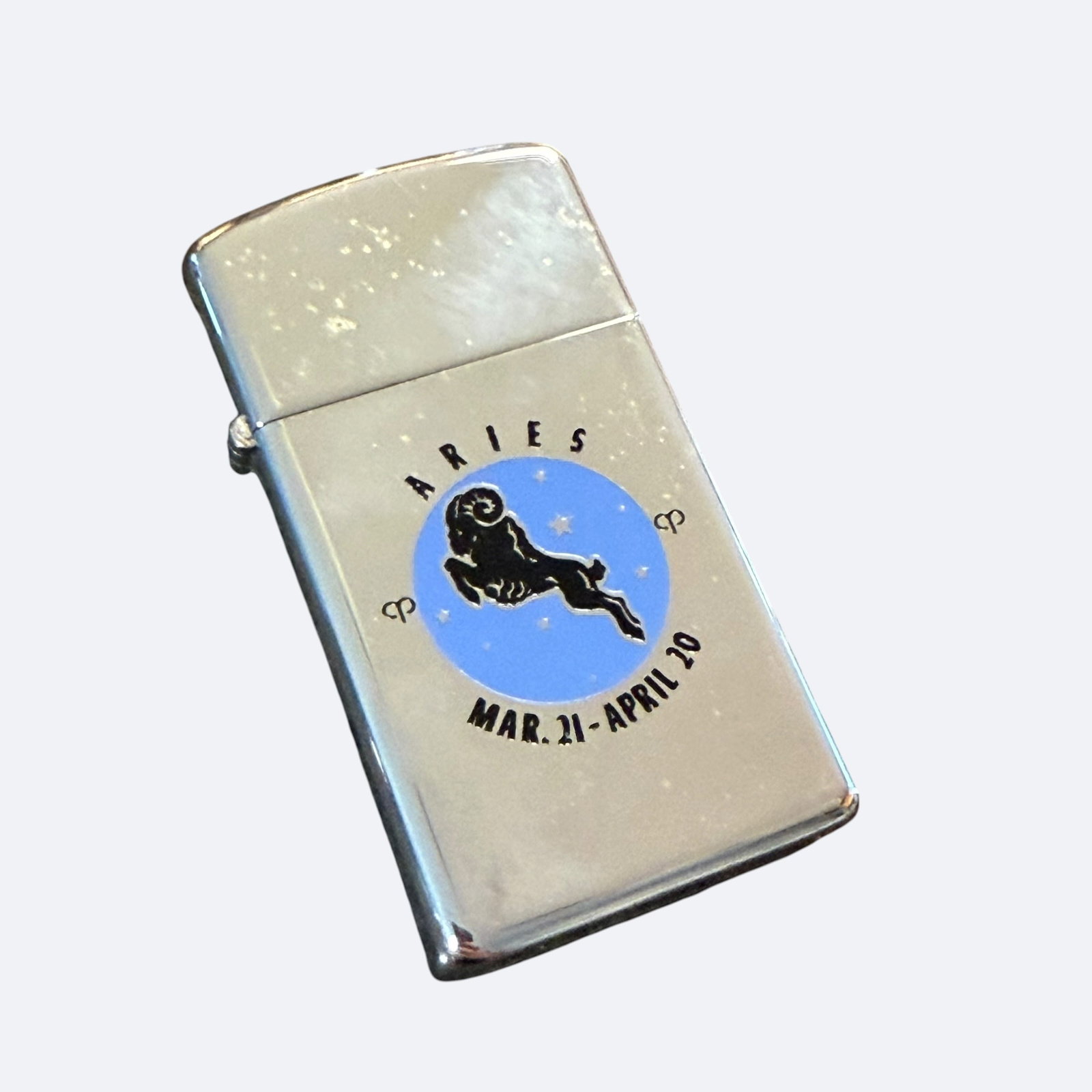 1970 Zodiac Zippo Slim Pocket Lighter Aries Unused Unfired Vintage: Description: Vintage 1970 bottom code Zippo Slim lighter from the Zodiac series, this one being Aries. March 21 - April 20. Unused, unfired condition. / Material: Metal. / Size: 1 1/8” x 2 3/16&
