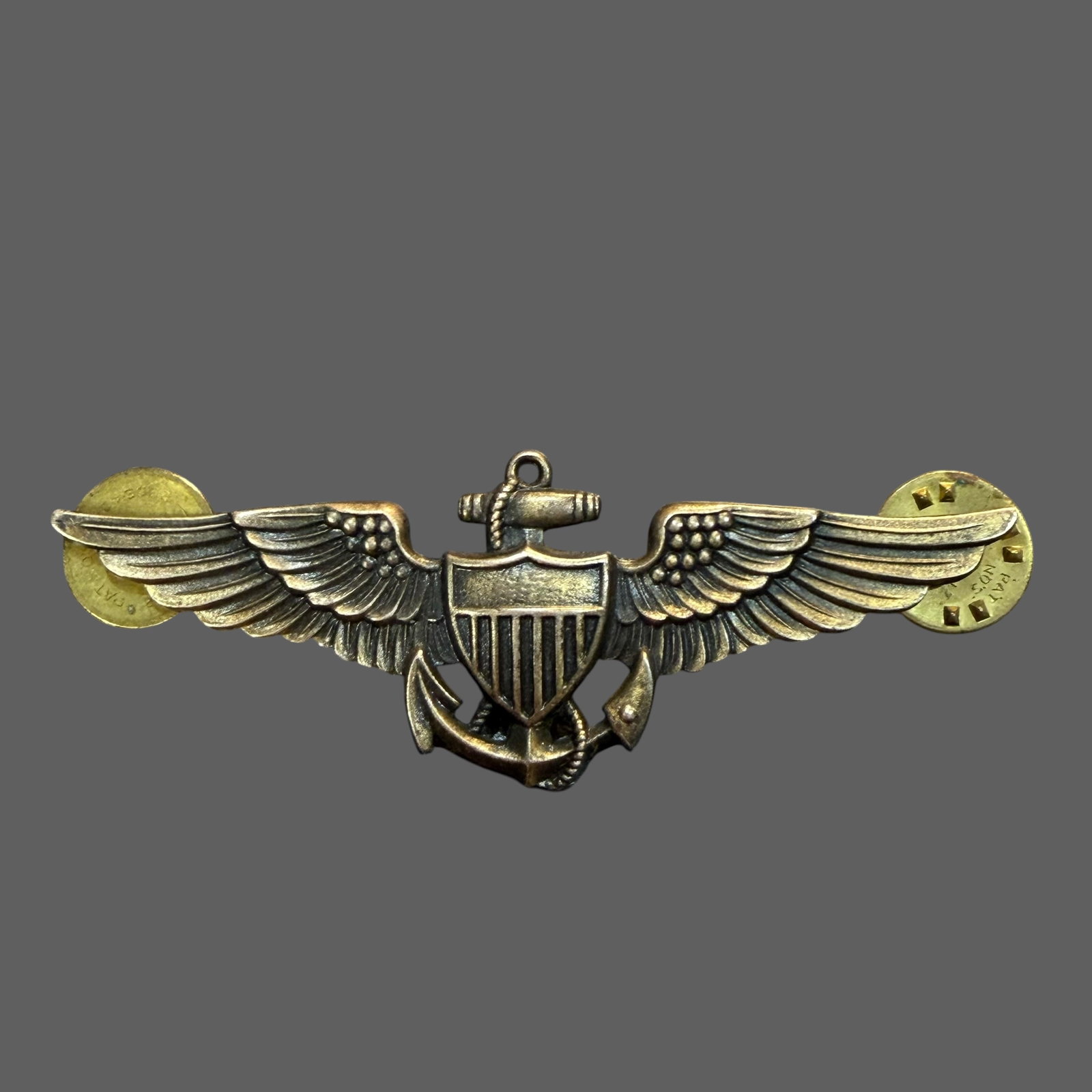 WW2 Vanguard US Naval Aviators Wings Badge Pin 1/20 10k GF Sterling Silver 9.05g: Description: Circa WWII US Navy Aviator Wings, by Vanguard. Silver and gold. / Material: 1/20 10k Gold Filled and Sterling Silver. / Size: 2.75” wide. 9.05 grams. / Condition: Ready to be enjoye