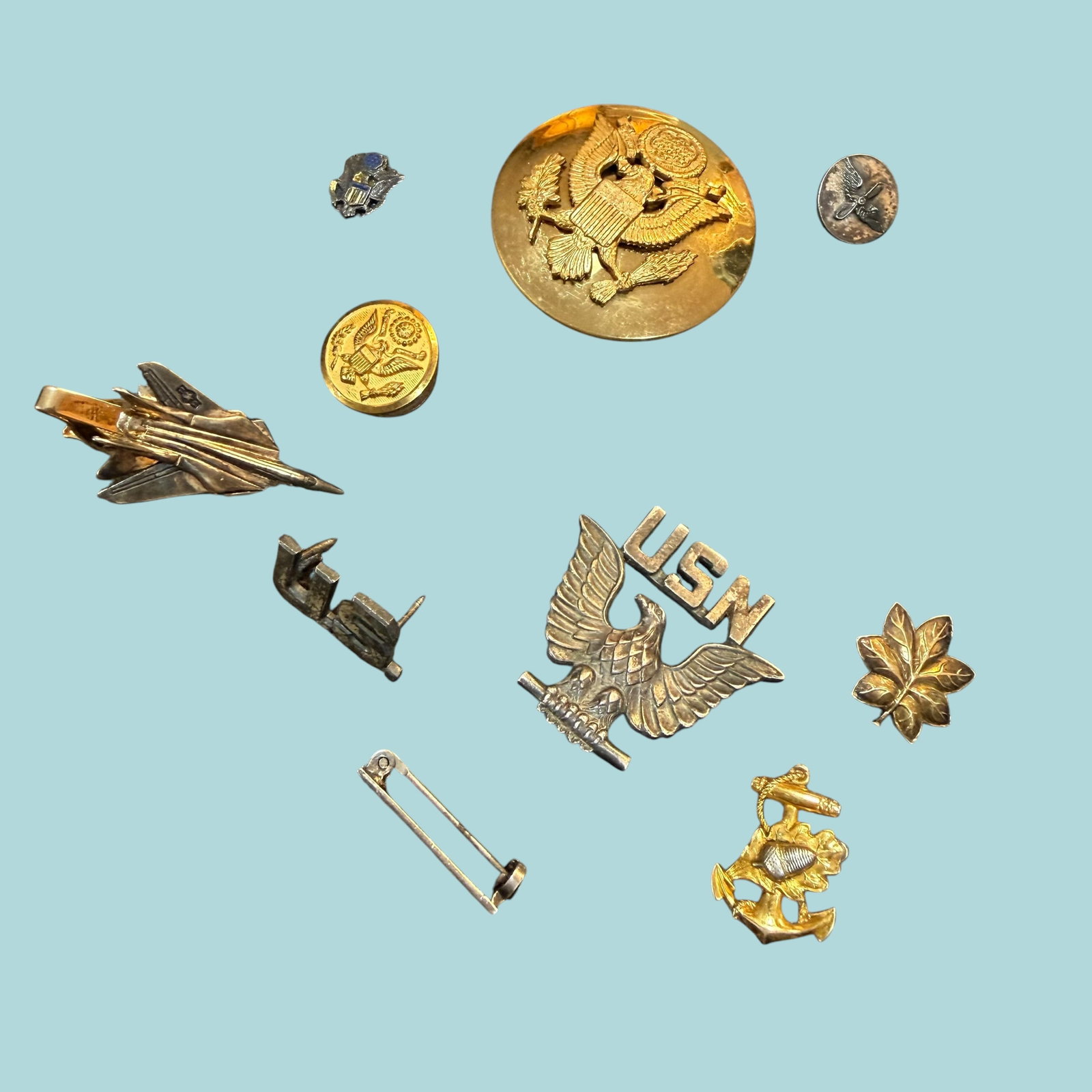 Vintage WW2 Sterling Silver US Military Pins Navy Army Air Force 27.65g: Description: 10 different military theme or use pins and tie bar. The two gold tone emblem pins/buttons, the USN Eagle is 1/20 silver filled, the tie bar Fighter Jet is Sterling with a gold tone clip,