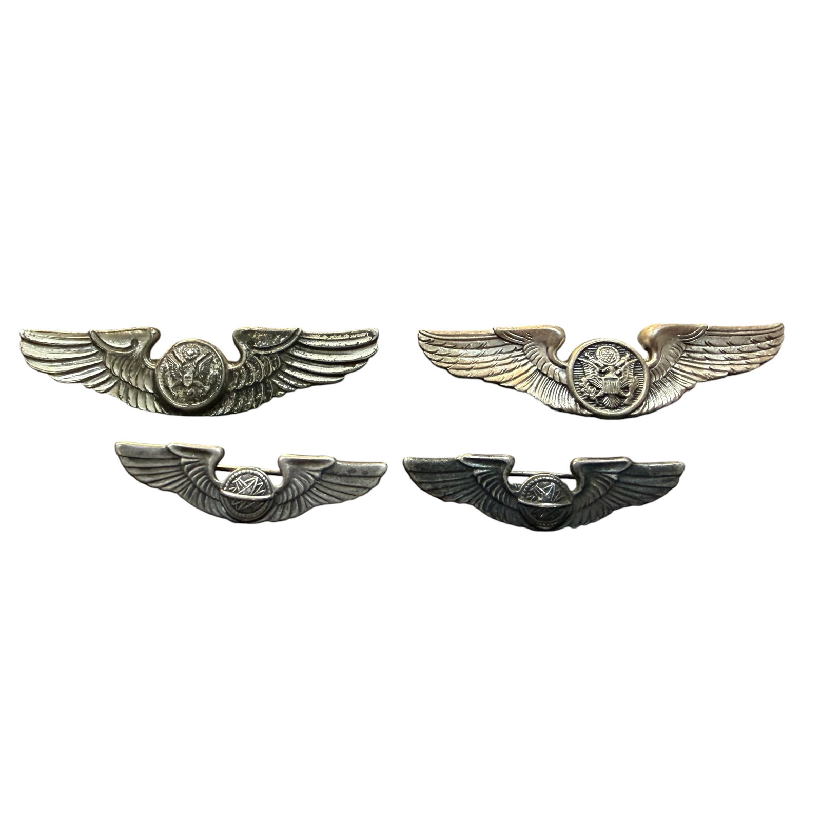 4 WW2 Sterling Silver USAAF Navigators Badge & Aircrew Wings 22.48g: Description: Four Vintage circa WWII Sterling Silver Army Air Force wings, two Navigators and 2 Aircrew. / Size: 1.4” and 2.0”. Combined weight 22.48 grams. / Condition: Ready to enjoy. Ov
