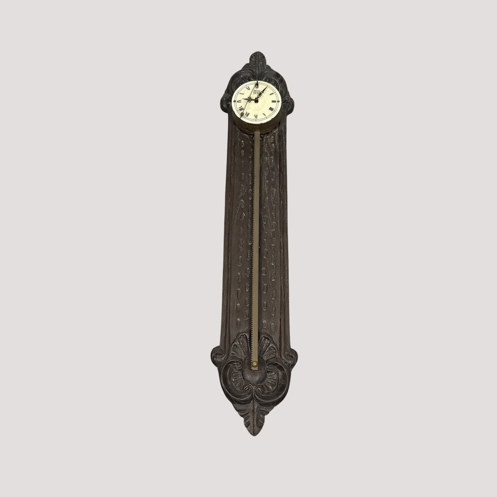 Carved Wood Anno 1750 Sawtooth Gravity Germany Wall Clock Colonial Company 120: Description: Reproduction German Sawtooth Gravity Wall Clock. Porcelain dial mechanism marked Anno 1750. Paper taped to back showing this to be sold as a kit from Colonial Manufacting Company of Zeela