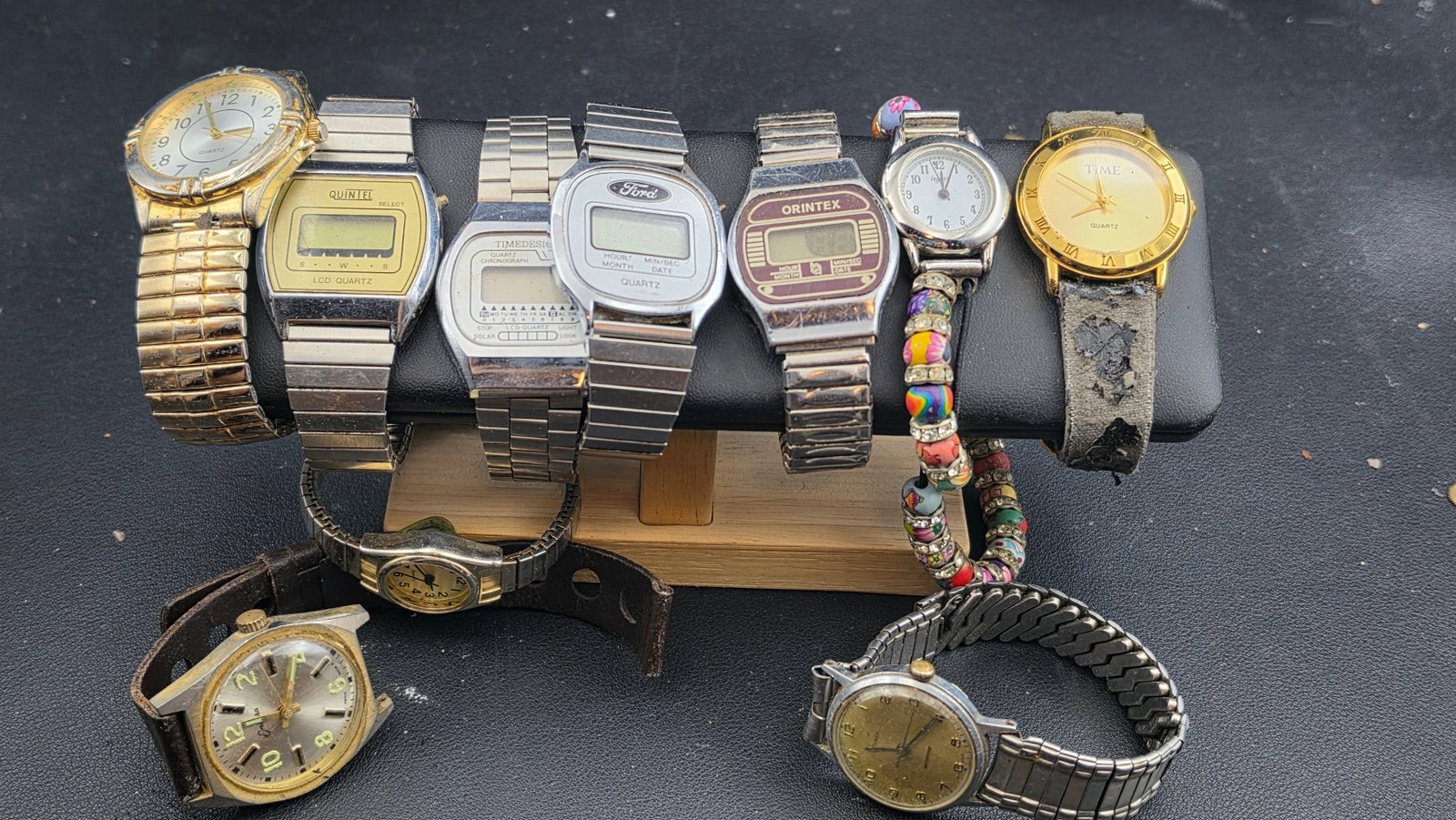 Lot of Vintage Watches Digital LCD Quartz Timex Ford Orintex Quintel: Lot of vintage watches spanning digital and analog styles. Notable inclusion: a Ford-branded LCD digital quartz watch, likely a corporate promotional piece, which may appeal to automotive collectors i