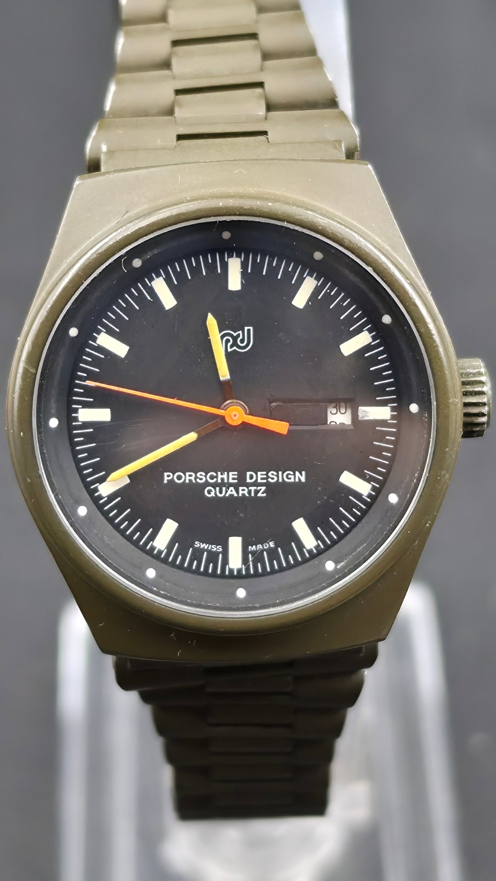 Porsche Design by Orfina, Ref. 7050.S, Quartz Day-Date, PVD Coated Stainless Steel, Swiss Made, New: This is an authentic Porsche Design watch produced by Orfina, part of the historically significant collaboration designed by Ferdinand Alexander "Butzi" Porsche in the 1970s-80s — the same design ho