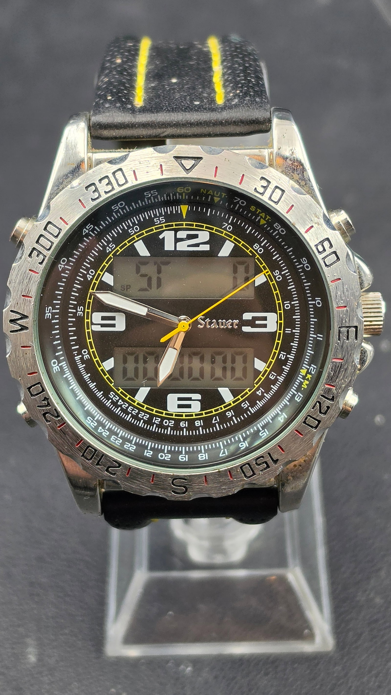 Stauer Centurion Hybrid Chrono Ana-Digi Aviator Watch, Ref. 20409: Stauer Centurion Hybrid Chrono ana-digi wristwatch, reference 20409, stainless steel case with rotating compass/navigation bezel. Black dial with combination analog hands and digital LCD display, yell