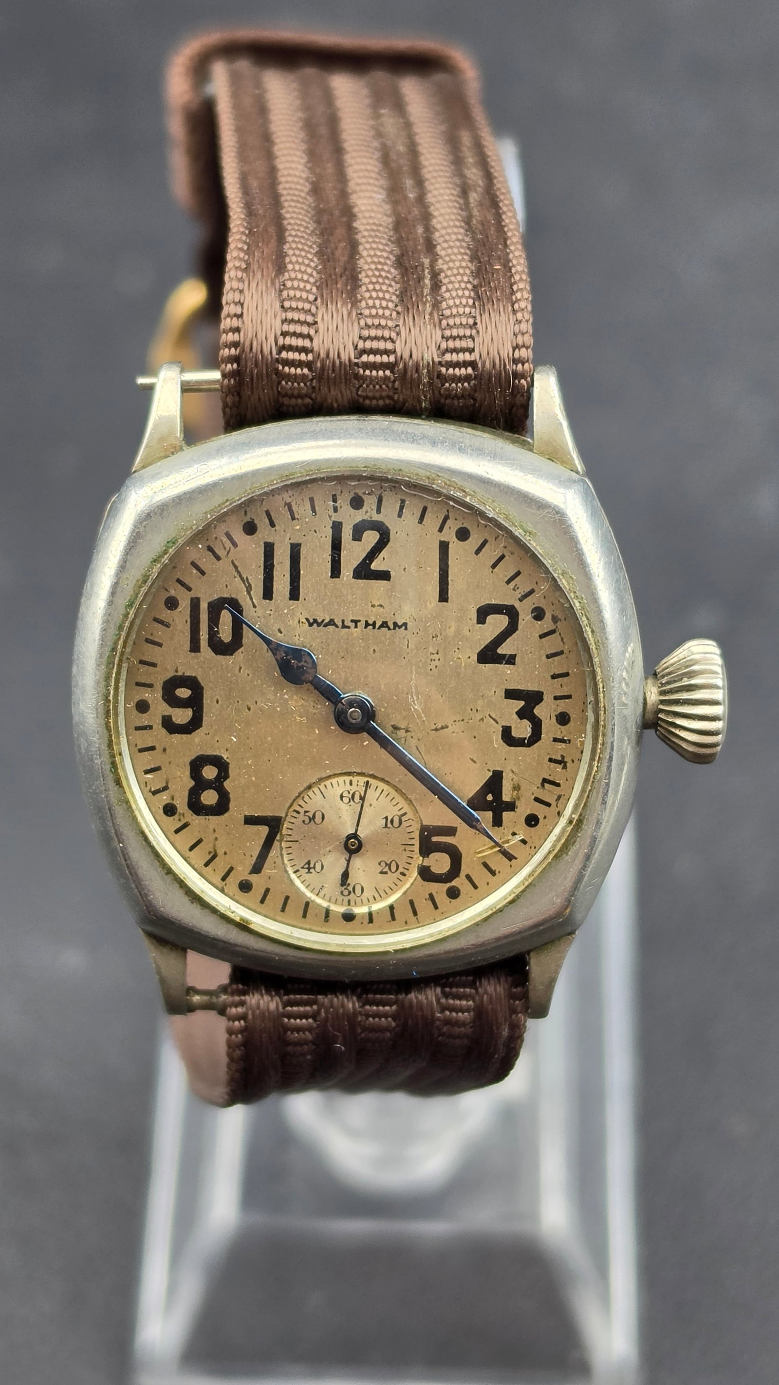 Vintage WWI-Era Waltham Trench Watch Cushion Case 7 Jewels: Vintage WWI-era Waltham trench-style wristwatch, circa late 1910s, with a nickel cushion case by the Illinois Watch Case Co., case serial 672930, measuring 31.16mm in diameter (case only, excluding cr