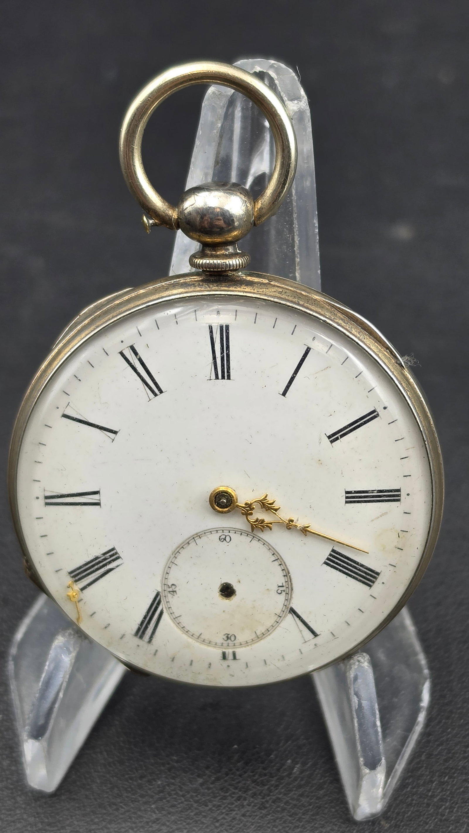 Antique Key Wind Cylinder Pocket Watch, Quatre Rubis, Engraved Case: This antique open-face pocket watch has a 47.94mm gilt-toned case with an engine-turned guilloché pattern and an engraved crest cartouche on the back (monogram not clearly legible). The case interior