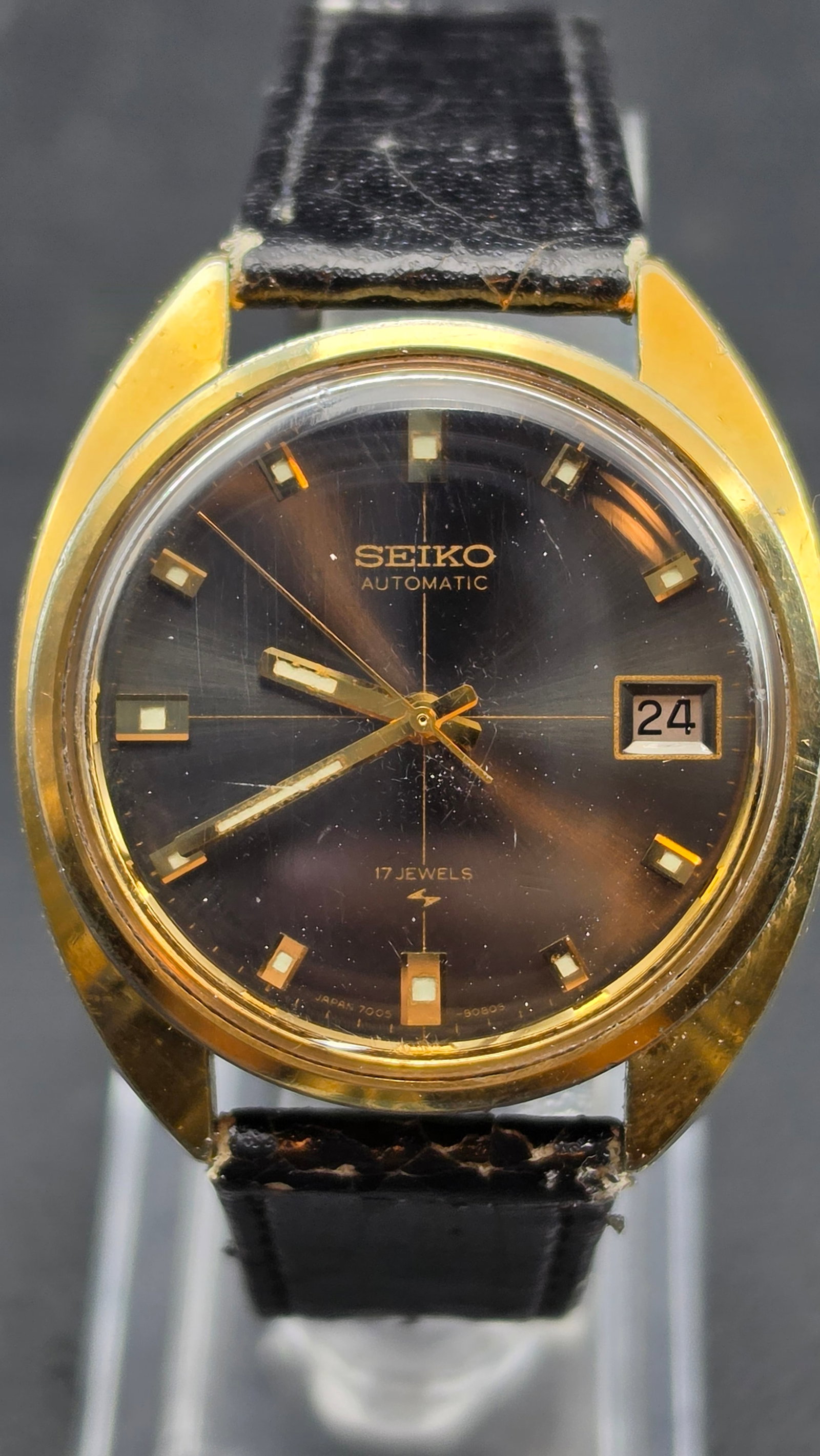 Seiko Automatic 7005-8030 Black Dial 1969 SGP Case Serial 990306 MACV-SOG Ref: Seiko Automatic, reference 7005-8030, powered by the caliber 7005 automatic movement, 17 jewels, with a date window at 3 o'clock. Black dial signed "Seiko," "Automatic," "17 Jewels," with the Seiko li