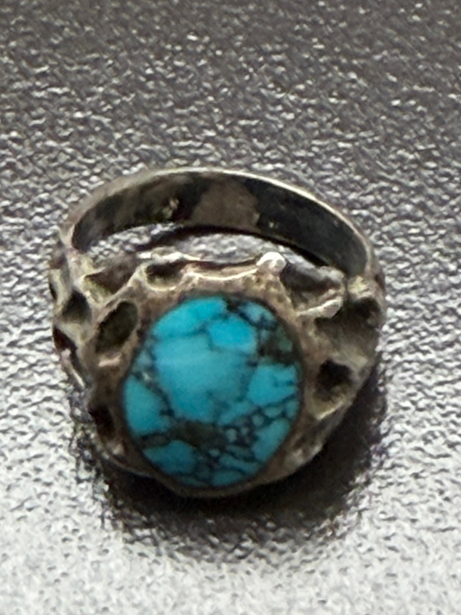 12g-Vintage Brutalist Sterling Silver Natural Turquoise Ring Modernist Artisan: Vintage sterling silver artisan ring featuring a vibrant natural blue turquoise cabochon set in a bold brutalist-style mounting with an organic openwork design. The sculptural setting gives the ring a