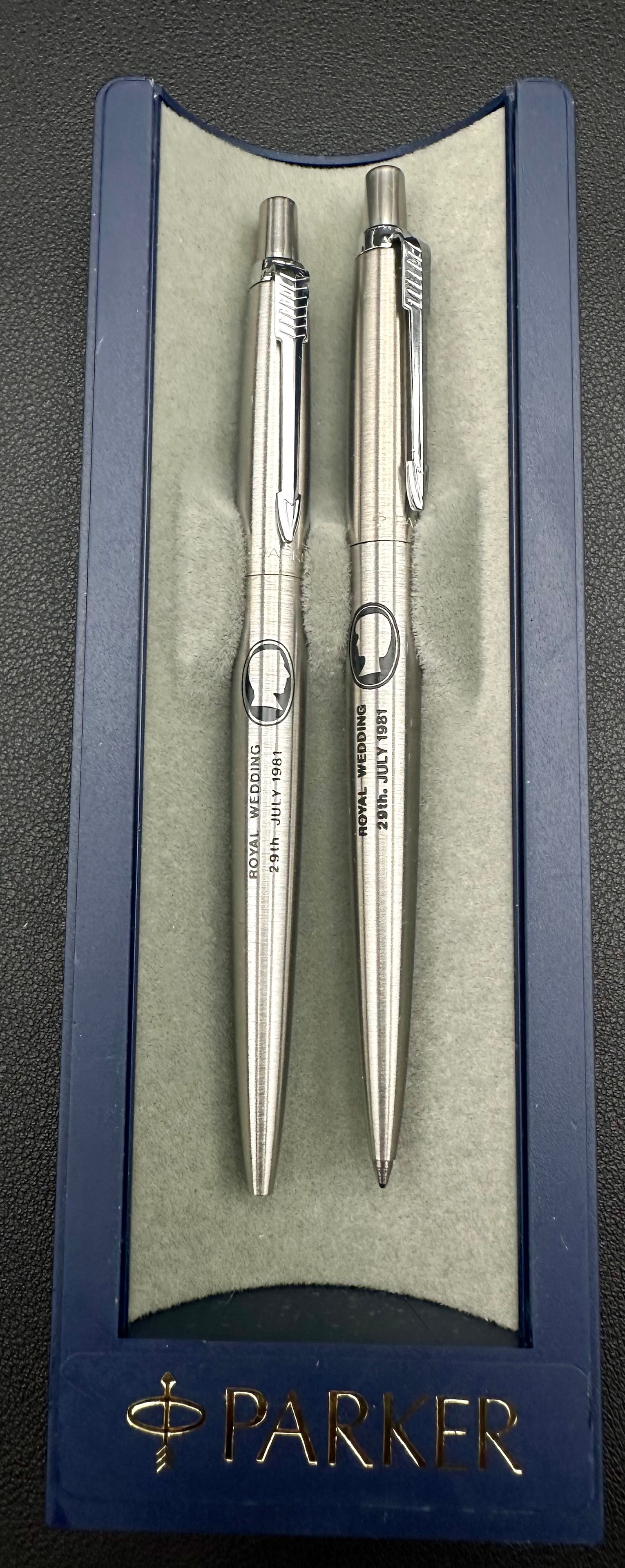 1981 Parker Royal Wedding Pen & Pencil Set Charles & Diana Boxed: Vintage Parker commemorative writing set celebrating the Royal Wedding of Prince Charles and Lady Diana Spencer, dated July 29, 1981. Includes a brushed stainless steel ballpoint pen and matching mech
