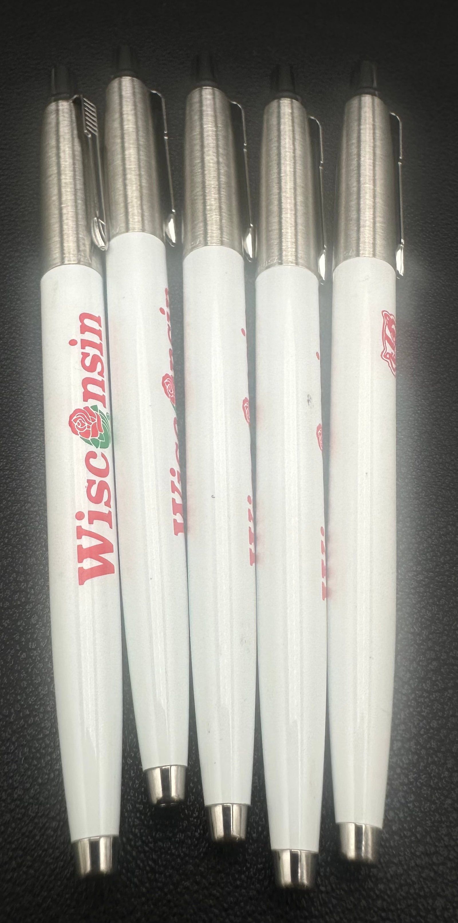 Lot of 5 Vintage WISC TV Madison WI Advertising Ballpoint Pens: Lot of five vintage WISC-TV advertising retractable ballpoint pens featuring white plastic barrels, brushed stainless steel upper barrels, chrome trim, and the red WISC logo with rose graphic. Promoti