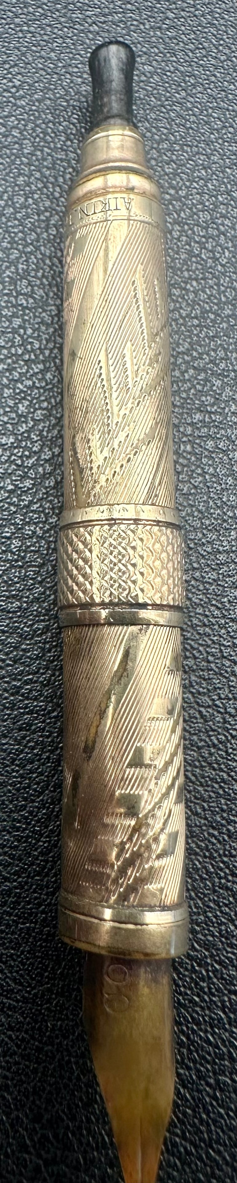 Antique Aikin Lambert & Co. No. 5 Victorian Telescopic Fountain Pen: Antique Aikin Lambert & Co. No. 5 Victorian telescopic fountain pen with an engraved sterling silver overlay in an engine-turned pattern and black hard rubber body. This retractable fountain pen is of