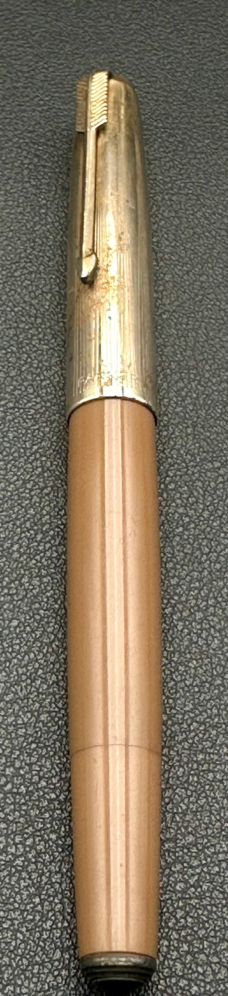 Vintage Parker 51 Cordovan Brown Ballpoint Pen Blue Diamond Jewel Top Personalized: Vintage Parker “51” ballpoint pen in Cordovan Brown with the desirable Blue Diamond arrow clip and original black cap jewel, dating to approximately 1948–1953. Gold-filled cap, personalized 