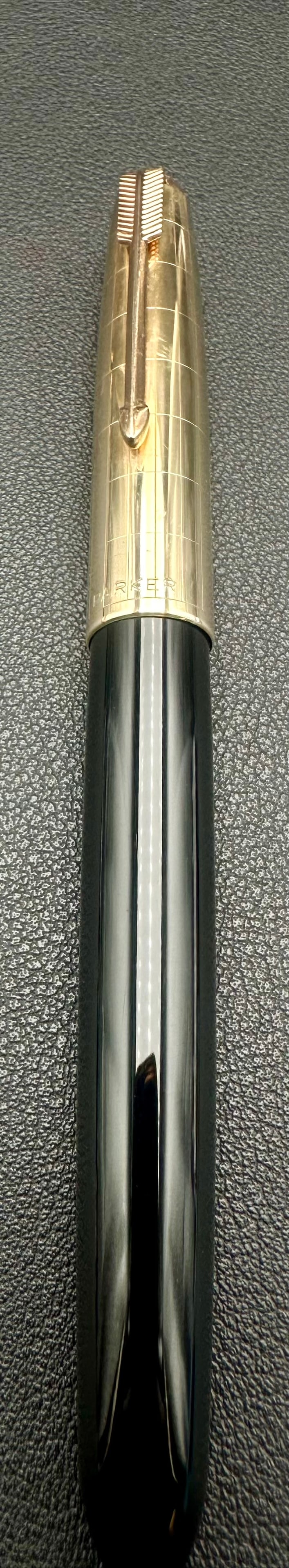 Parker 75 Ciselé 1/10 12K Gold Filled Ballpoint Pen France: Vintage Parker 75 Ciselé twist ballpoint pen featuring the classic crosshatch (grid) pattern in 1/10 12K gold-filled finish with black resin lower barrel. The cap is marked “1/10 12K Gold Filled&rd