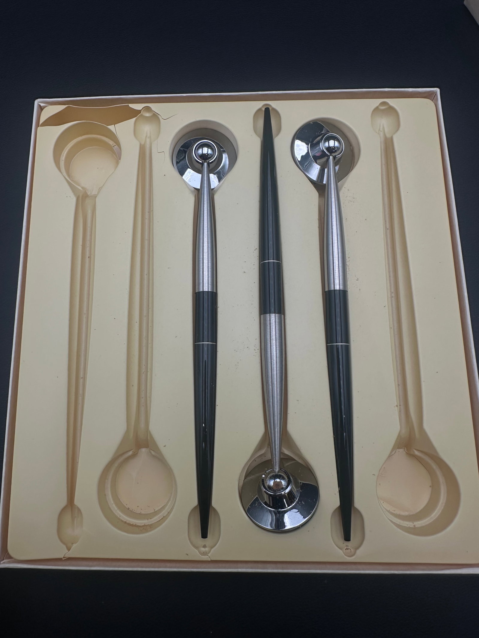 Vintage Mid-Century Modern Chrome Desk Pen Set 3 Holders: Vintage mid-century modern desk pen set with three matching taper-style desk pens and three chrome weighted pen holders. Features black and brushed chrome finishes with a sleek Space Age design, datin