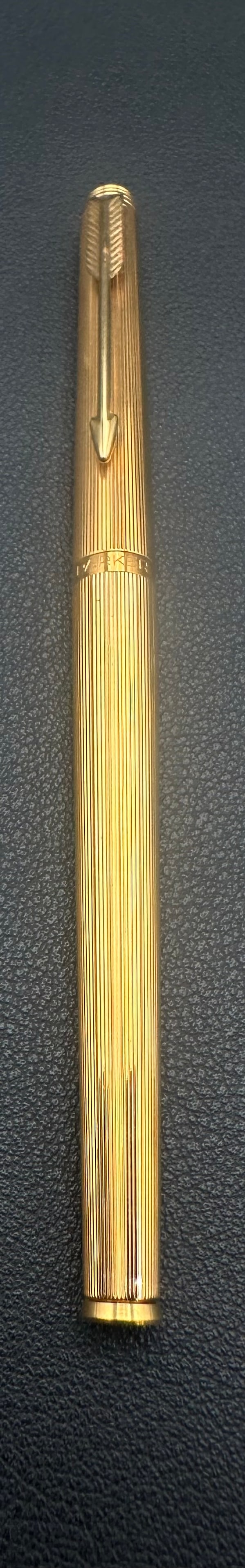 Parker Sonnet Gold Plated Lined Fountain Pen 14K 585 M Nib France: Vintage Parker Sonnet fountain pen featuring a gold-plated lined finish with gold-plated trim and Parker Arrow clip. Fitted with an original 14K (585) Medium nib. Made in France. Shows light cosmetic 