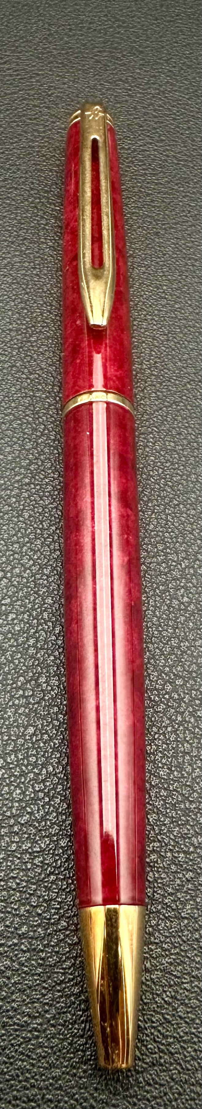 Waterman Hémisphère Red Marble Lacquer Gold Trim Ballpoint Pen France: Vintage Waterman Hémisphère ballpoint pen featuring a rich red marble lacquer finish with gold-plated trim and the classic Waterman clip. Made in France, this elegant slim-profile pen is part of Wat