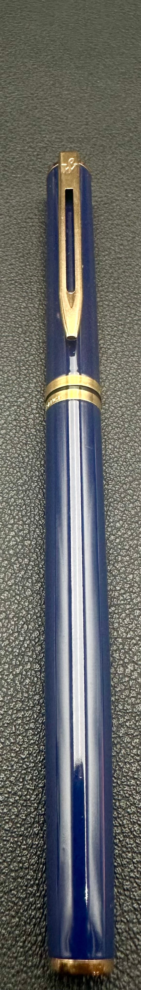 Waterman Hemisphere Blue Lacquer Fountain Pen Fine Steel Nib France: Vintage Waterman Hemisphere fountain pen featuring a glossy blue lacquer barrel and cap with gold-plated trim. Fitted with the original gold-plated stainless steel Fine (F) nib marked “Waterman Fran