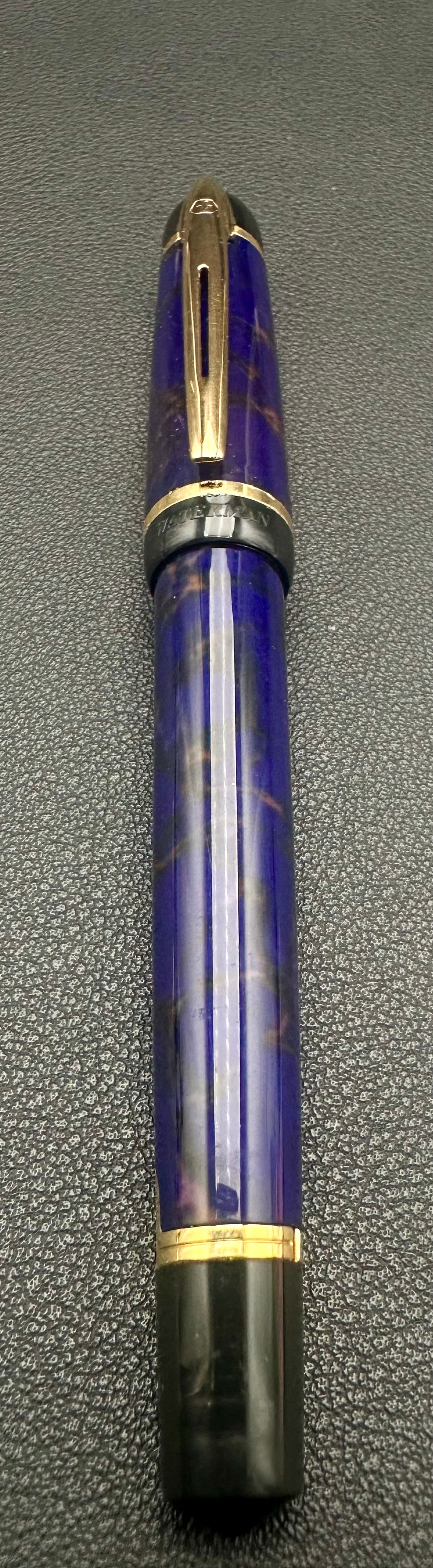 Waterman Phileas Blue Marble Fountain Pen Fine Steel Nib Franc: Vintage Waterman Phileas fountain pen in the sought-after Blue Marble lacquer finish with gold-plated trim. Features the original Fine (F) gold-plated stainless steel Waterman nib and is marked Waterm