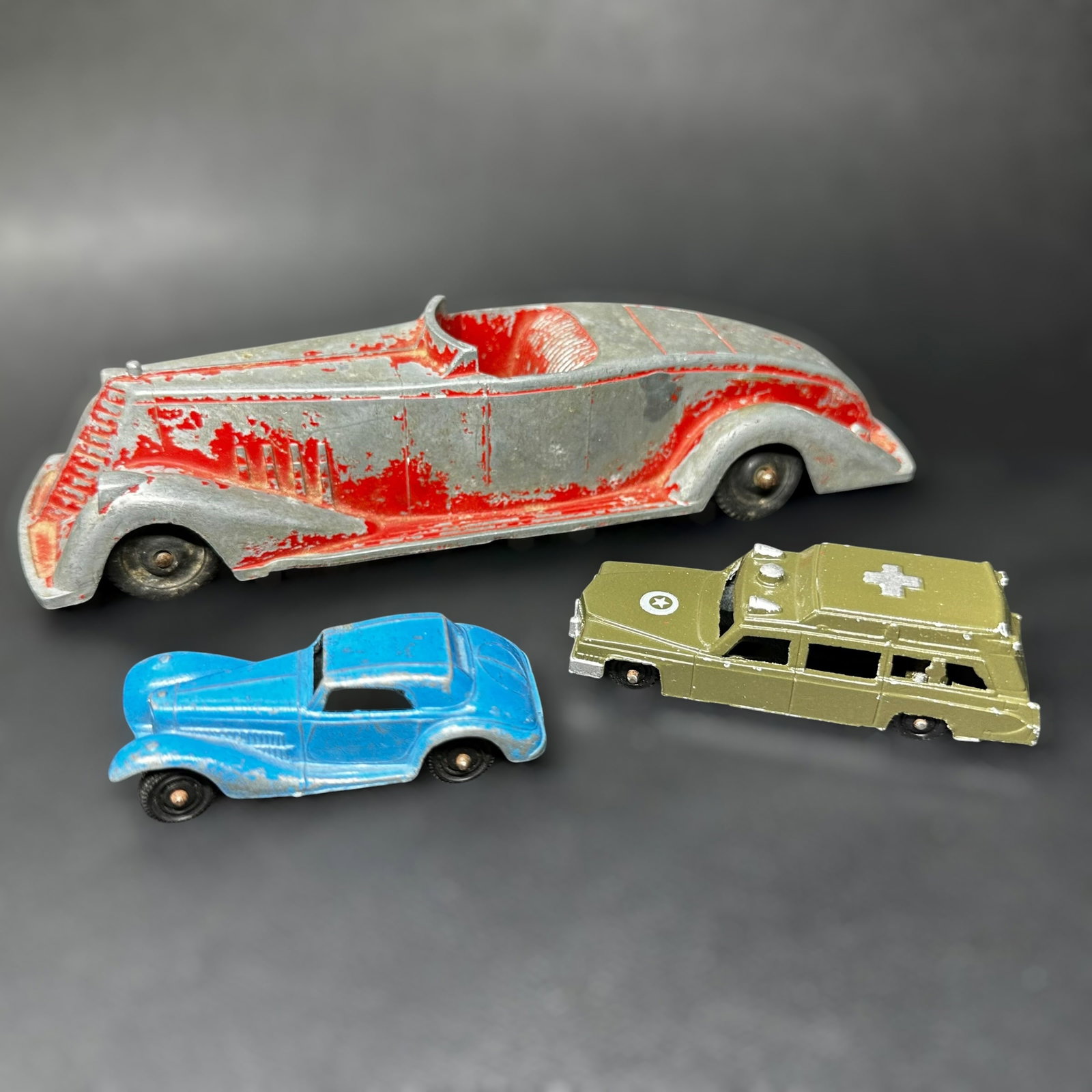 Vintage Die Cast Toy Car Lot: Vintage Die Cast Toy Car Lot:Brand/Model: Metal Masters Co. convertible, Midget Rockford ambulance, and coupe. No hallmark.Manufacturer Location: Made in U.S.A. (Metal Masters Co. convertible). Midget