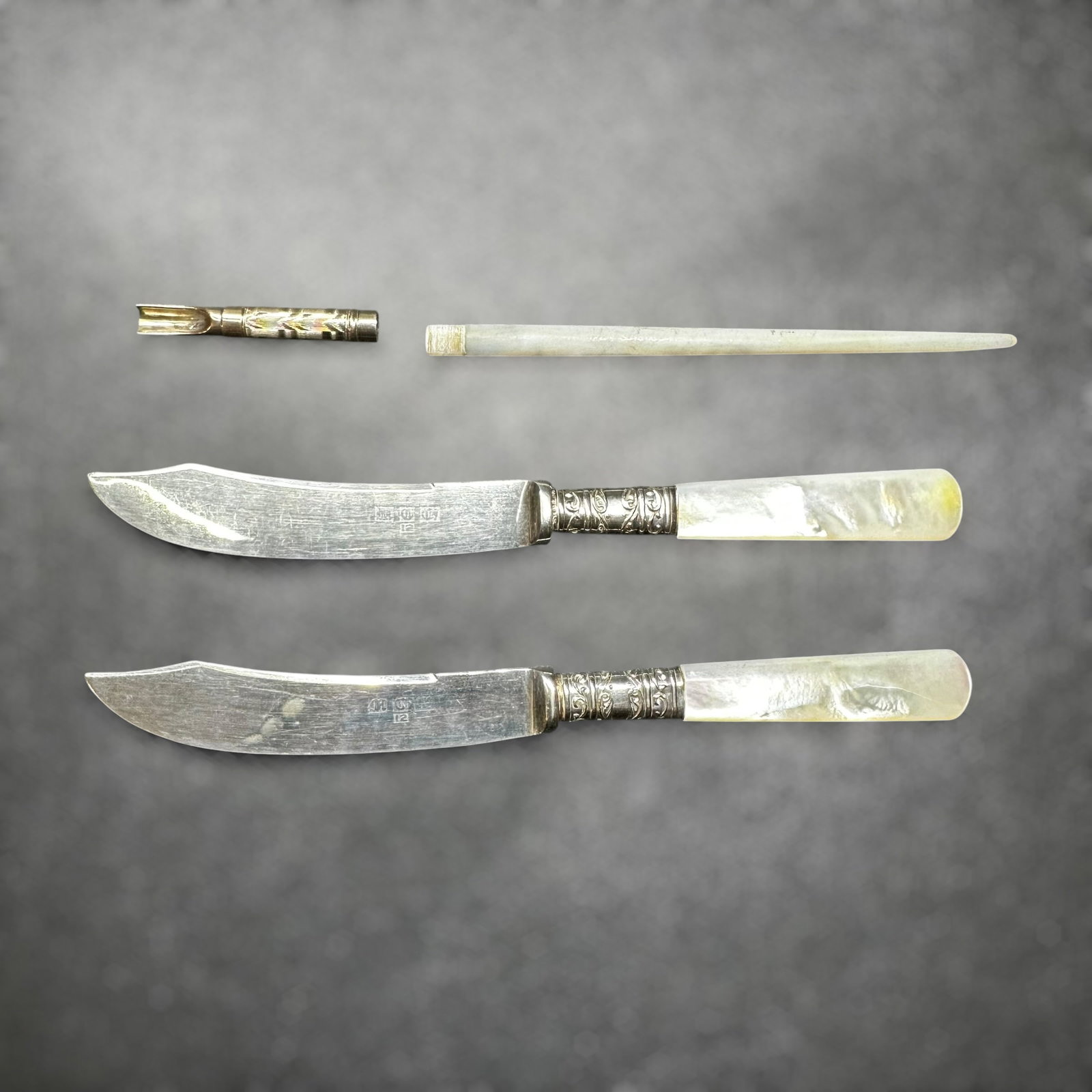 Vintage Silver Tone Mother Of Pearl Letter Opener Desk Set: Vintage Silver Tone Mother Of Pearl Letter Opener Desk Set:Brand/Model: No hallmark. Unidentified artisan/shop.Manufacturer Location: England.Year Produced: Unknown.Condition: Overall good vintage con