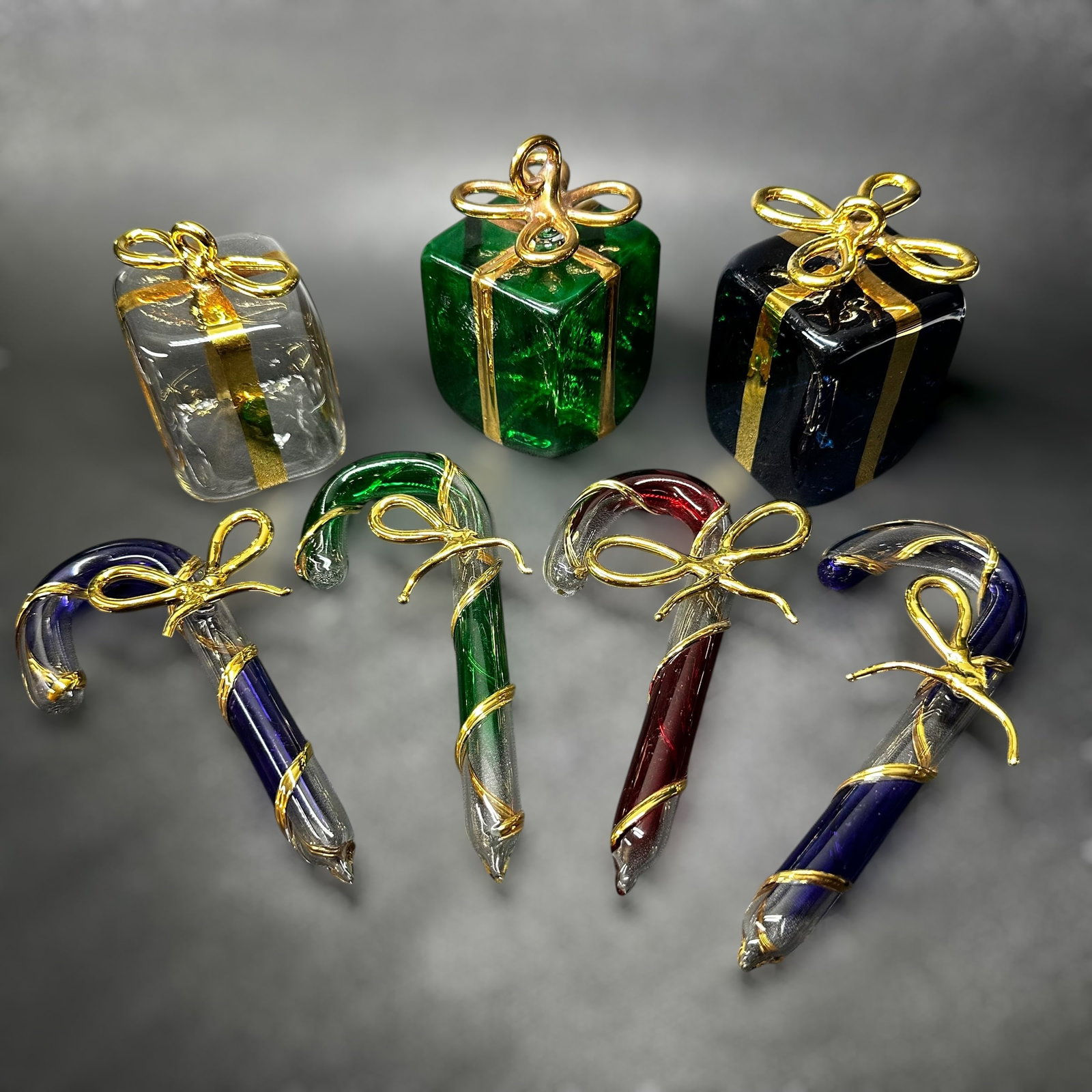 Murano Glass Christmas Figurines Gift Box & Cane Lot: Murano Glass Christmas Figurines Gift Box & Cane Lot:Brand/Model: No hallmark. Unidentified artisan/shop.Manufacturer Location: Not marked.Year Produced: Unknown.Condition: Overall good vintage condit
