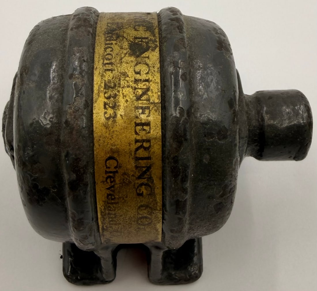Vintage Howell Red Band Motor Paperweight: Vintage cast iron advertising paperweight resembling a Howell Red Band electric motor. This compact collectible measures approximately 2” x 2.5” x 2” and features a raised central