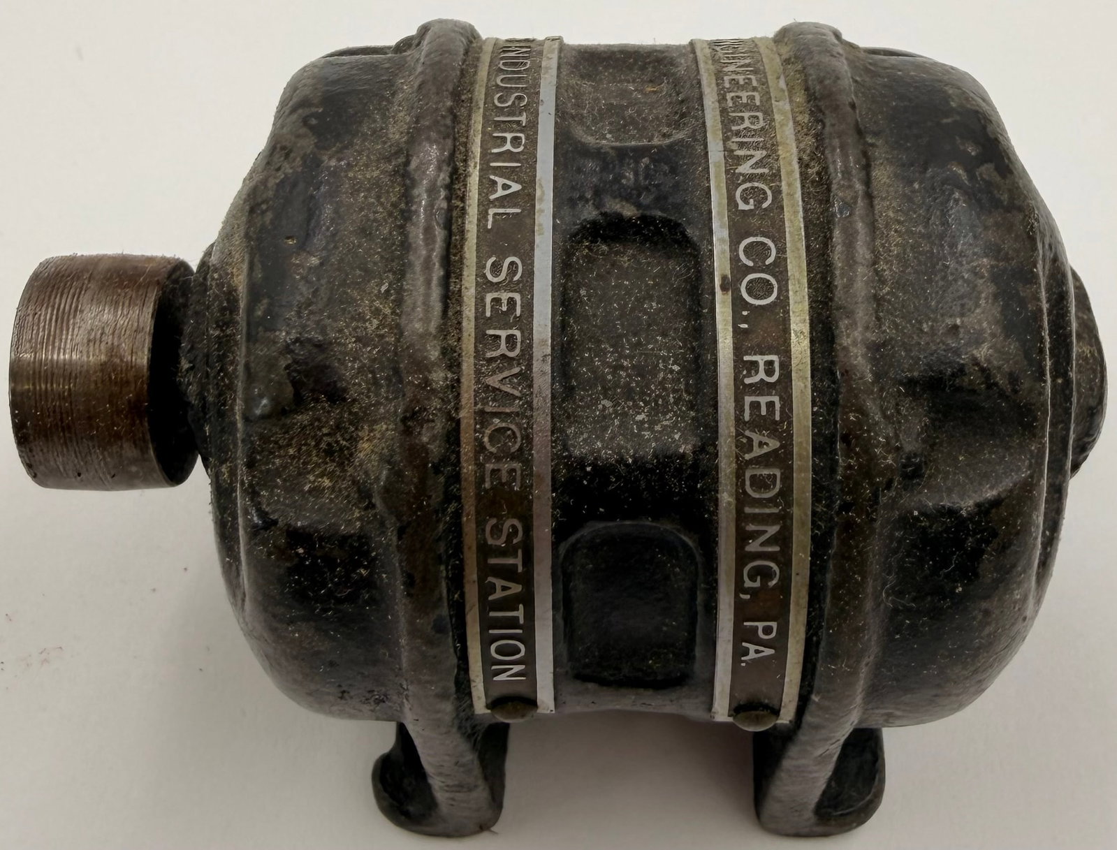 Vintage Berks Engineering Co Motor Paperweight: Vintage Berks Engineering Co. cast iron electric motor paperweight featuring a distinctive spheroid-style motor design and raised metal identification plates. This piece is a miniature industrial