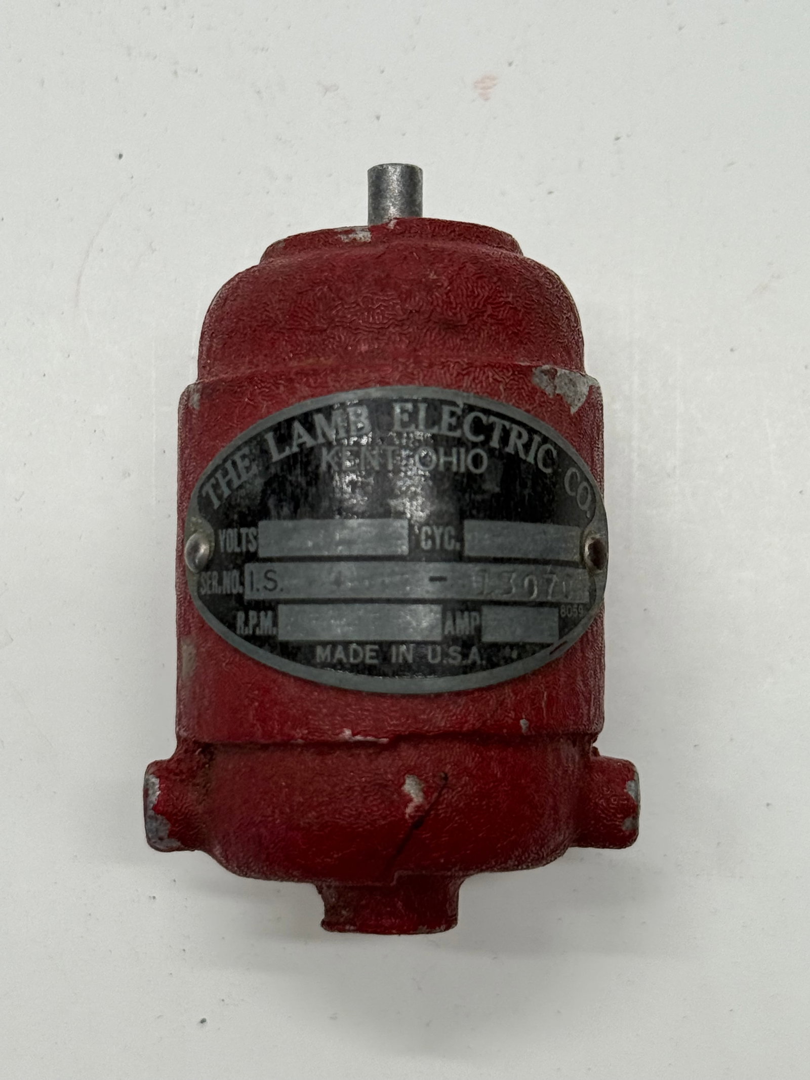 Vintage Lamb Electric Motor Paperweight: Vintage cast metal Lamb Electric Co. promotional paperweight modeled after an industrial electric motor. Features the original red textured finish and factory nameplate marked Kent, Ohio, Made in U.S.