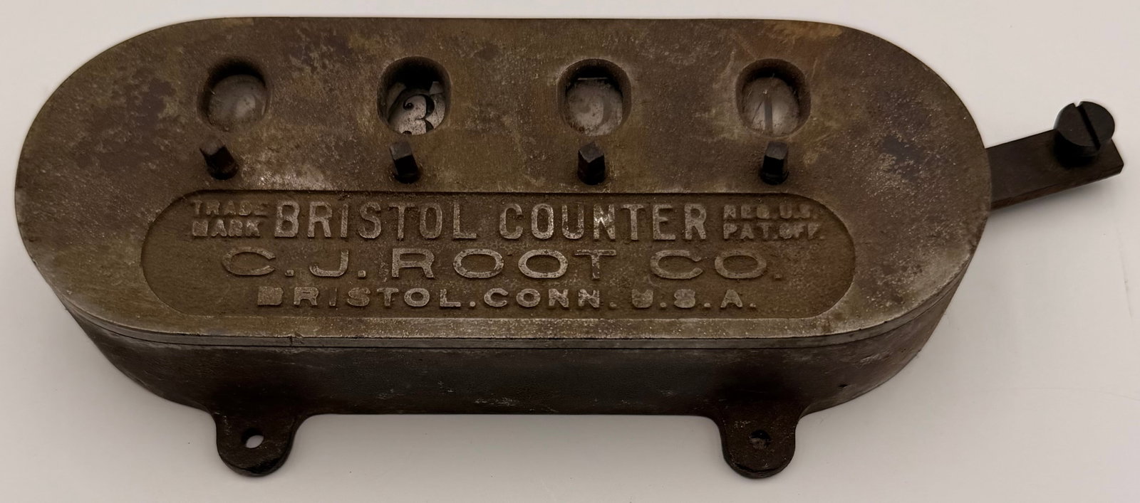 Antique C.J. Root Bristol Counter: Antique Bristol Counter manufactured by the C.J. Root Company of Bristol, Connecticut. These cast iron mechanical counters were patented around 1891 and were used in industrial settings to manually co