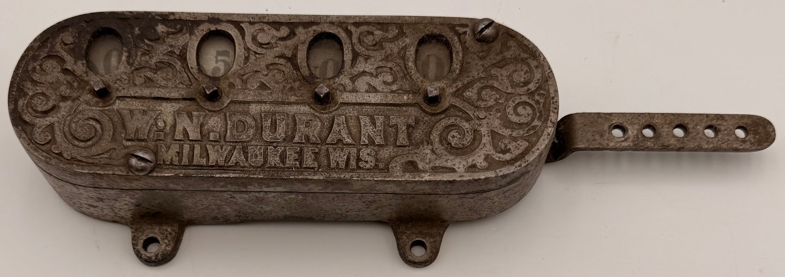 Antique W.N. Durant Tally Counter: Antique W.N. Durant four-digit mechanical tally counter manufactured in Milwaukee, Wisconsin. Constructed of cast iron, this industrial counter was commonly used for factory piecework, production coun