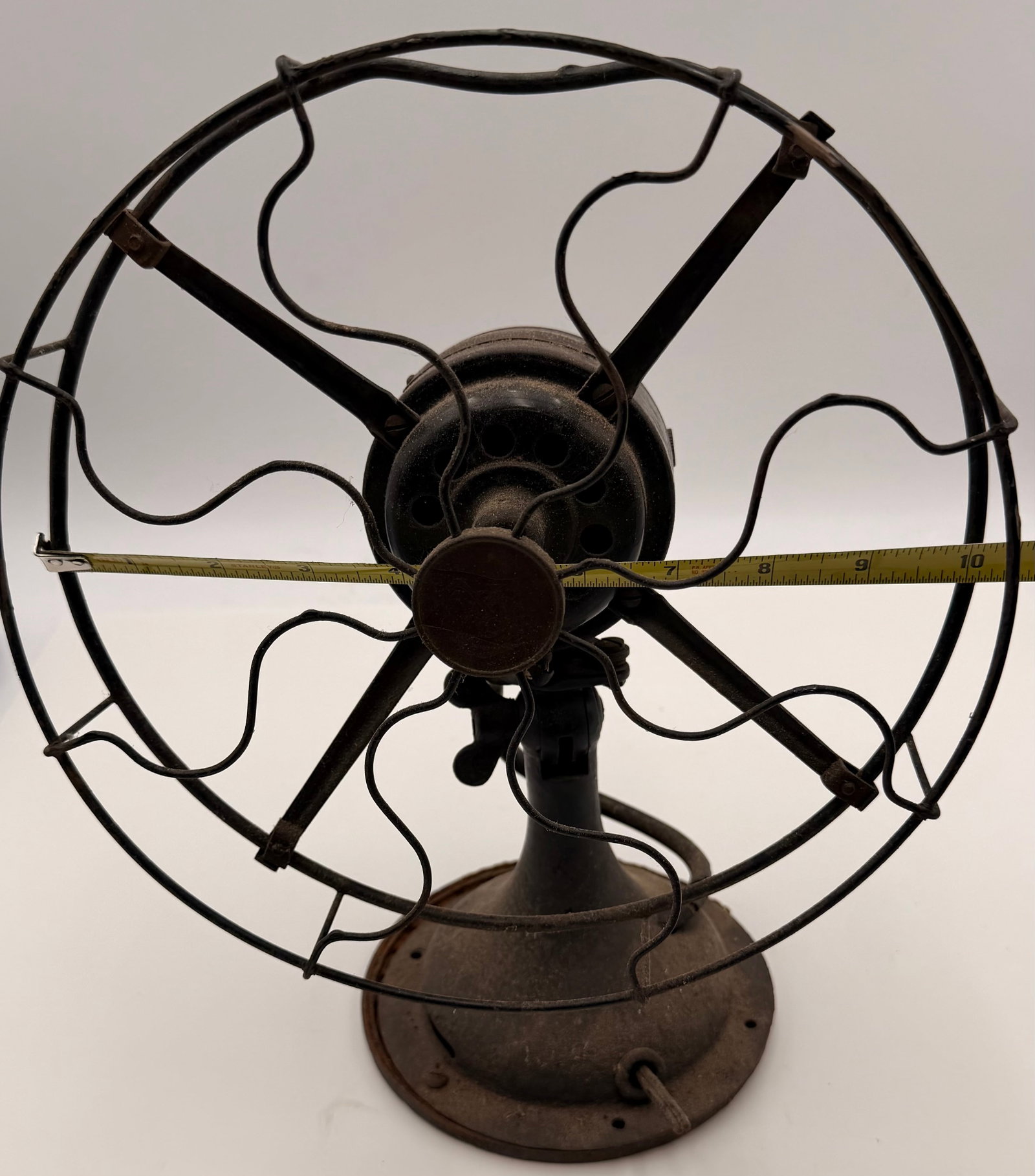 Vintage GE Style 10” Brass Blade Table Fan: This vintage 10-inch table fan features a classic early 20th-century design with four brass blades and a distinctive wave-pattern wire cage. The styling is consistent with antique industrial table fan