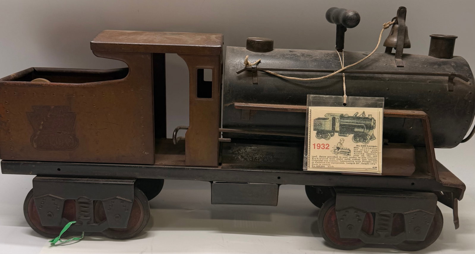 Antique Keystone R.R. 6400 Ride-On Locomotive: This antique Keystone R.R. No. 6400 Ride-On Locomotive is a classic pressed steel children’s riding toy featuring heavy-gauge steel construction and original rubber tires. Produced by the Keystone M