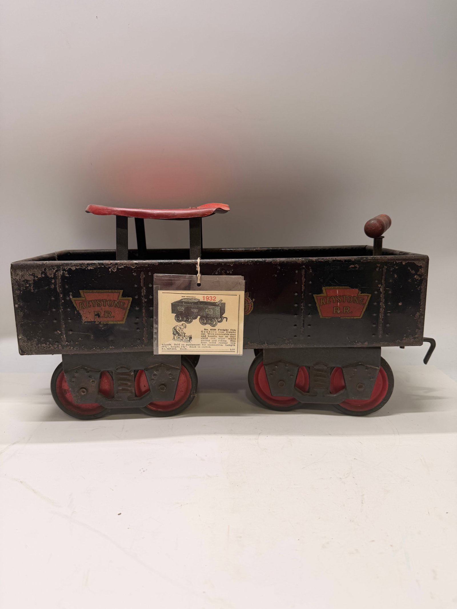 Rare 1932 Keystone R.R. No. 6500 Ride-On Gondola Freight Car: Vintage 1932 Keystone R.R. No. 6500 pressed steel ride-on gondola freight car. Features original Keystone Railroad decals, removable seat with steering handle, solid rubber tires, and pressed steel co
