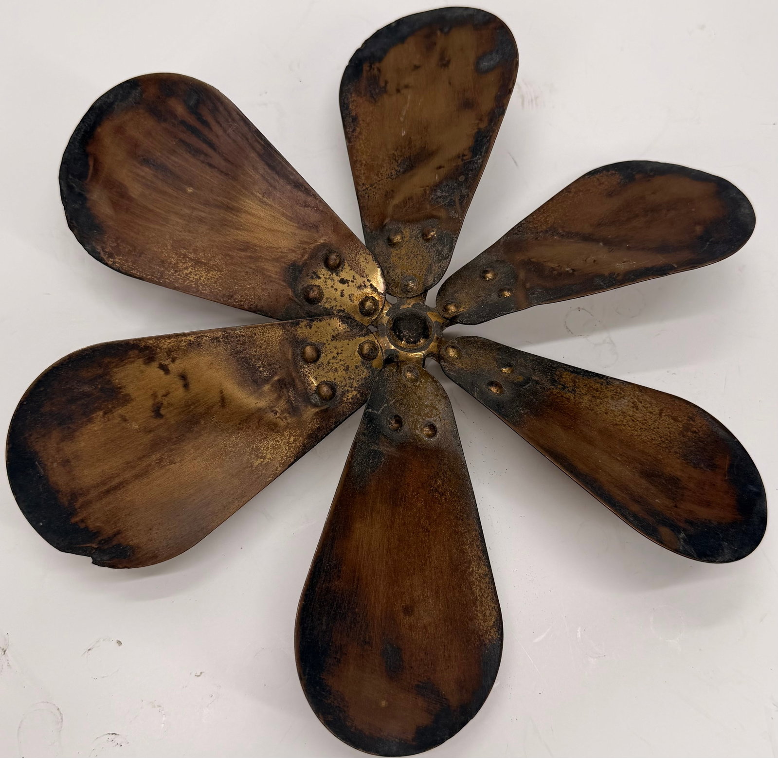 Antique 12” Brass 6 Wing Fan Blade: This antique 6-wing brass fan blade assembly is an original replacement component from an early 20th-century electric fan. It measures approximately 12 inches in overall diameter, with each individual