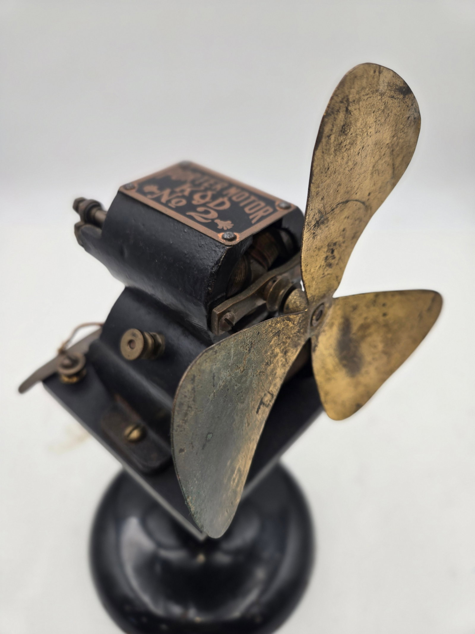 Porter Motor No. 2 with a brass fan attachment, manufactured by Kendrick & Davis (K&D). (1 of 8)